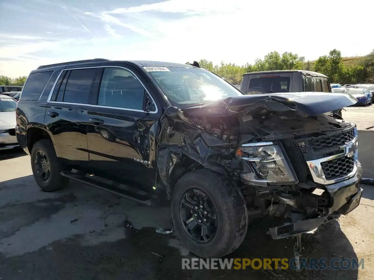 4 Photograph of a damaged car 1GNSKAKC2KR180071 CHEVROLET TAHOE 2019