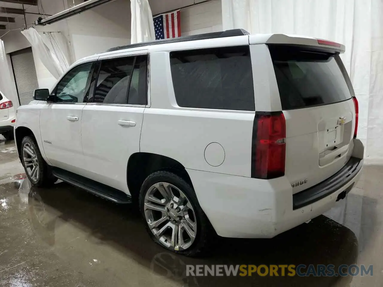 2 Photograph of a damaged car 1GNSKAKC7KR279792 CHEVROLET TAHOE 2019