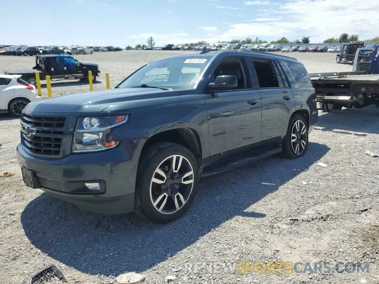 1 Photograph of a damaged car 1GNSKBKC2KR145004 CHEVROLET TAHOE 2019