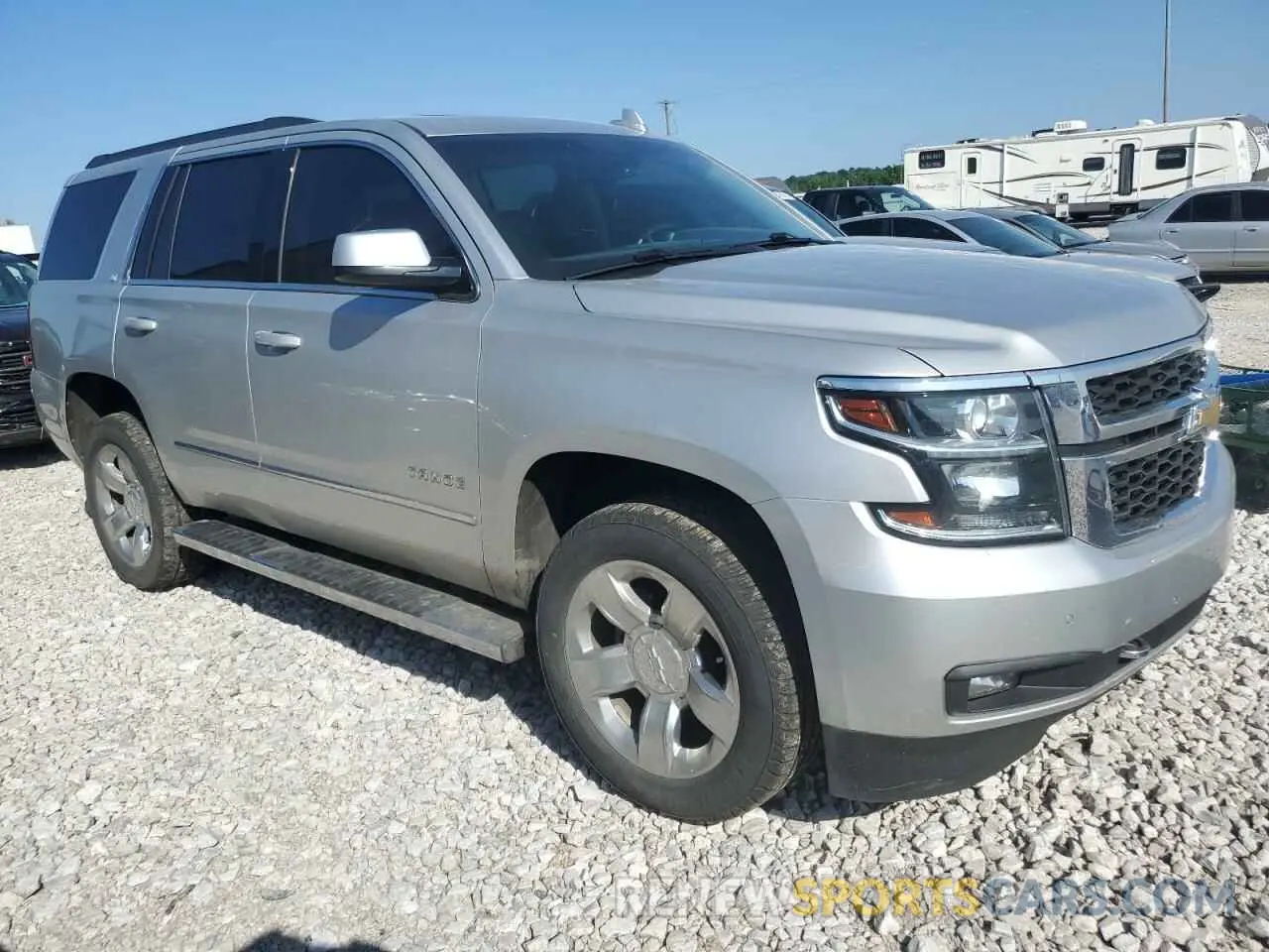 4 Photograph of a damaged car 1GNSKBKC2KR208134 CHEVROLET TAHOE 2019