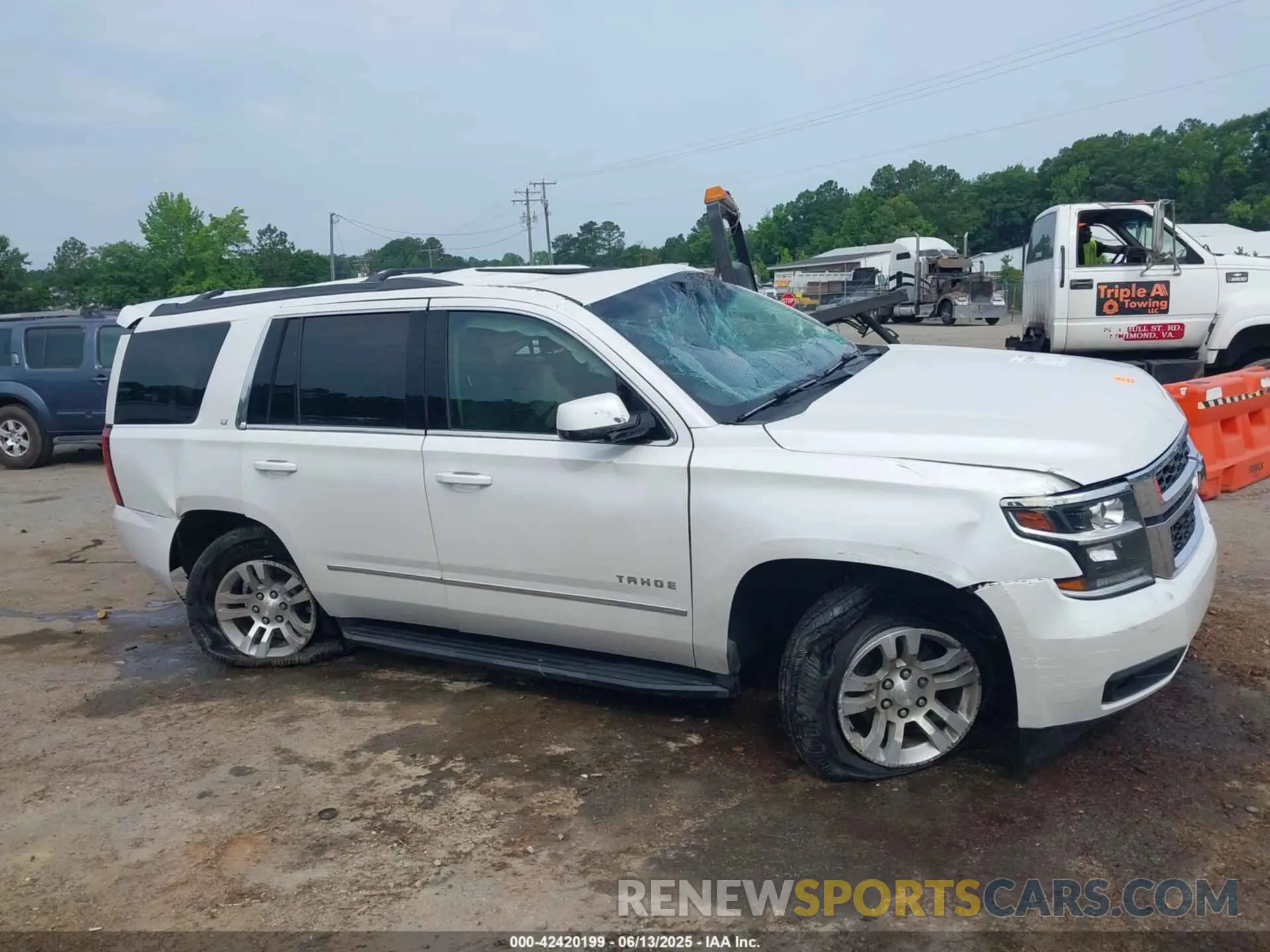 13 Photograph of a damaged car 1GNSKBKC3KR144850 CHEVROLET TAHOE 2019
