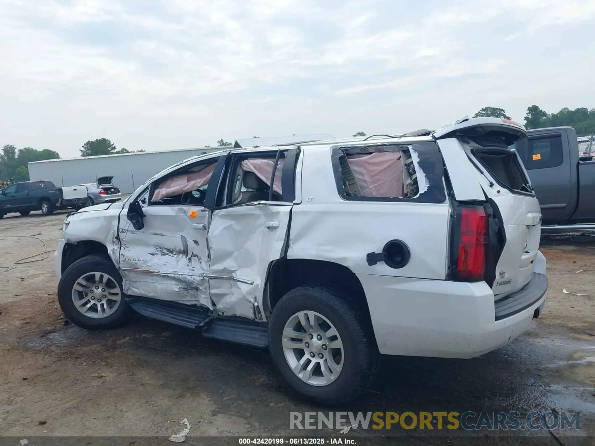 14 Photograph of a damaged car 1GNSKBKC3KR144850 CHEVROLET TAHOE 2019