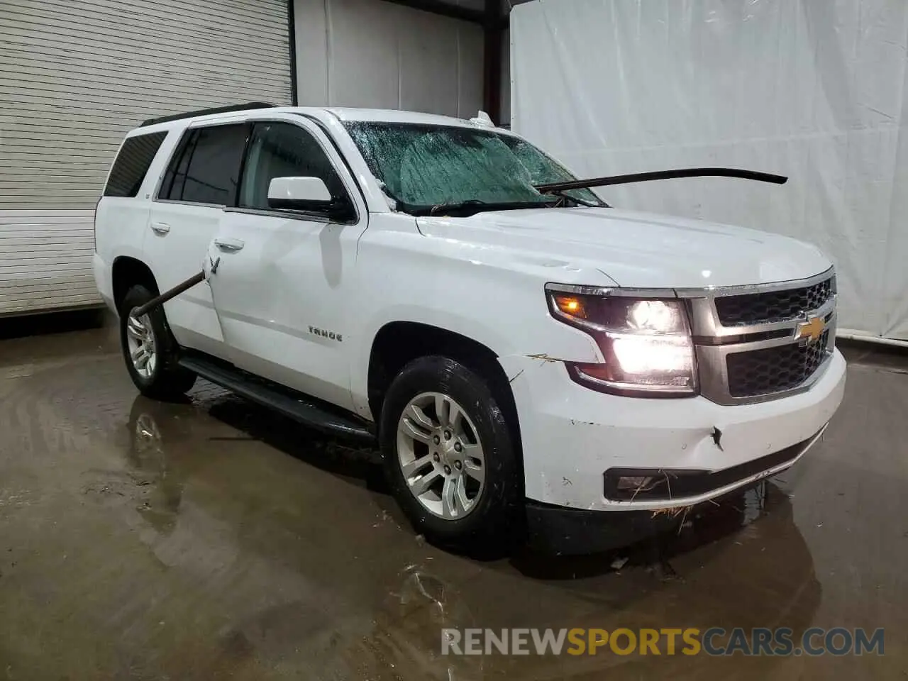 4 Photograph of a damaged car 1GNSKBKC3KR307481 CHEVROLET TAHOE 2019