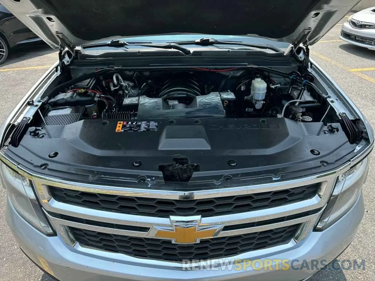 9 Photograph of a damaged car 1GNSKBKC5KR127144 CHEVROLET TAHOE 2019