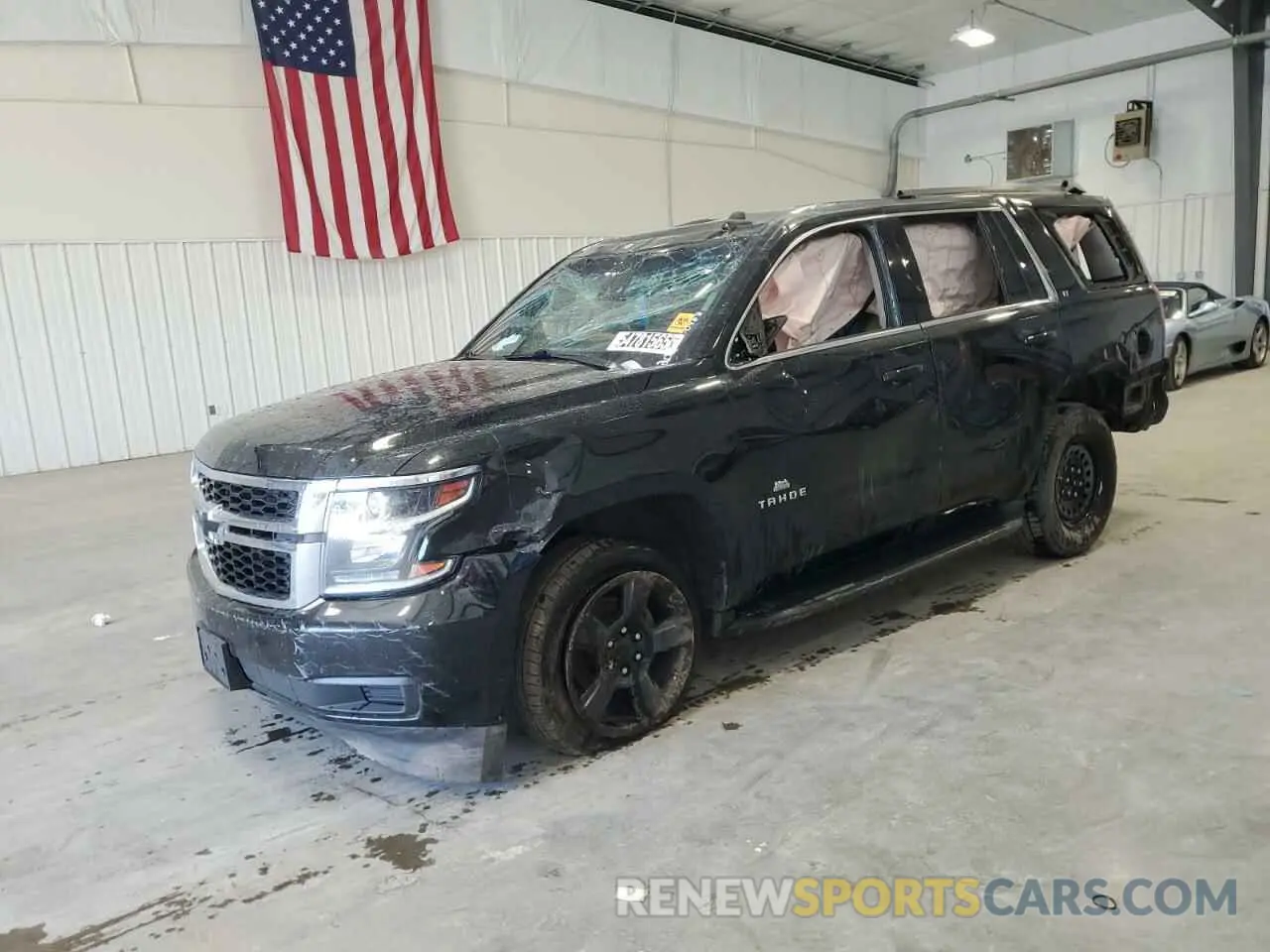 1 Photograph of a damaged car 1GNSKBKC5KR186372 CHEVROLET TAHOE 2019
