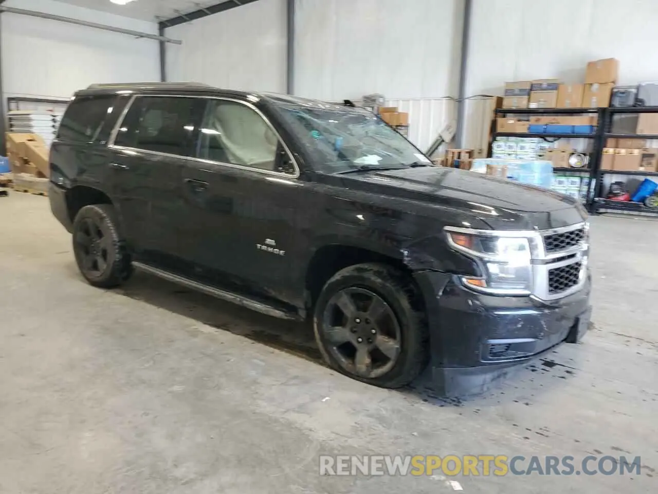 4 Photograph of a damaged car 1GNSKBKC5KR186372 CHEVROLET TAHOE 2019