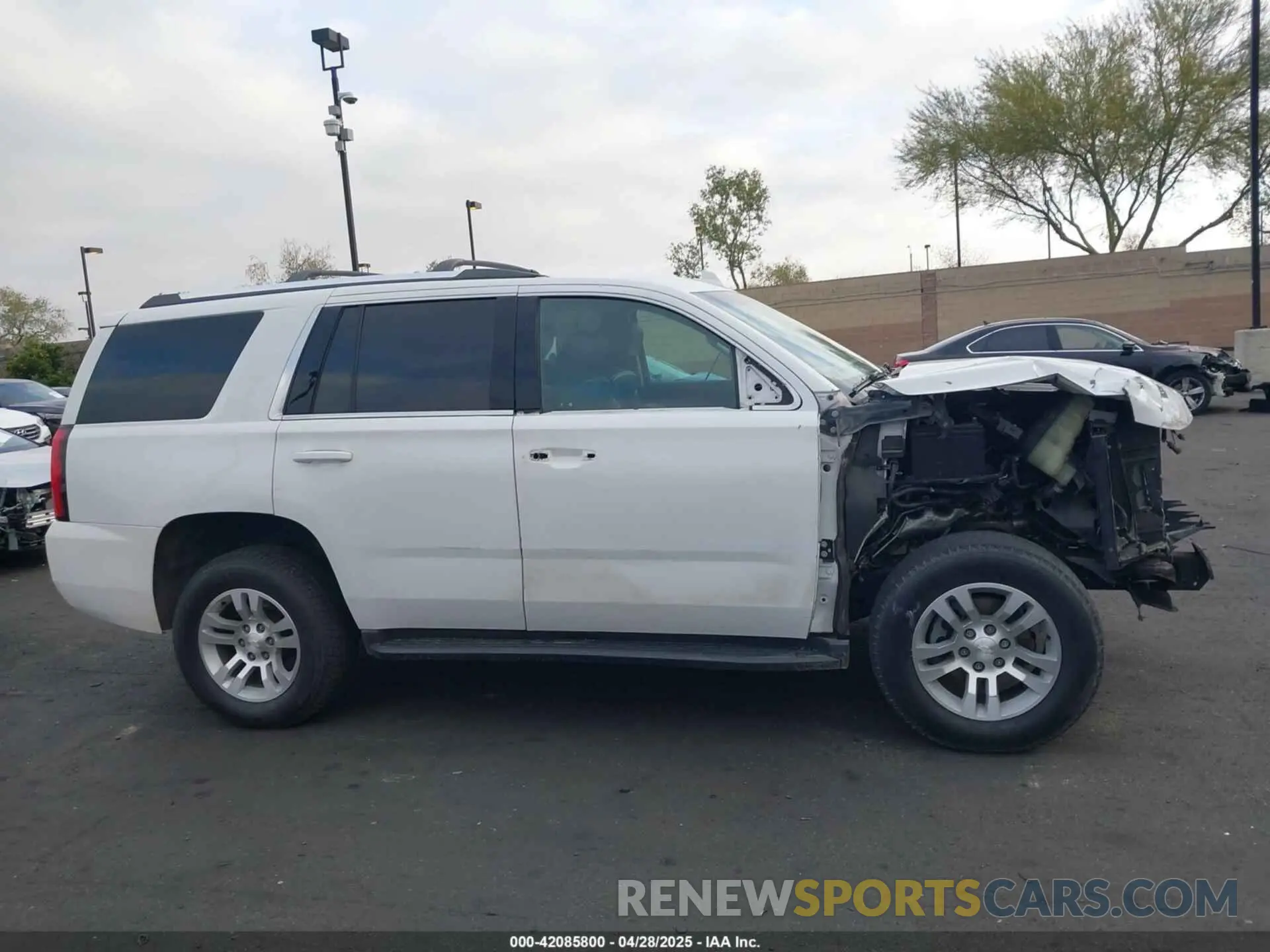 14 Photograph of a damaged car 1GNSKBKC5KR273544 CHEVROLET TAHOE 2019