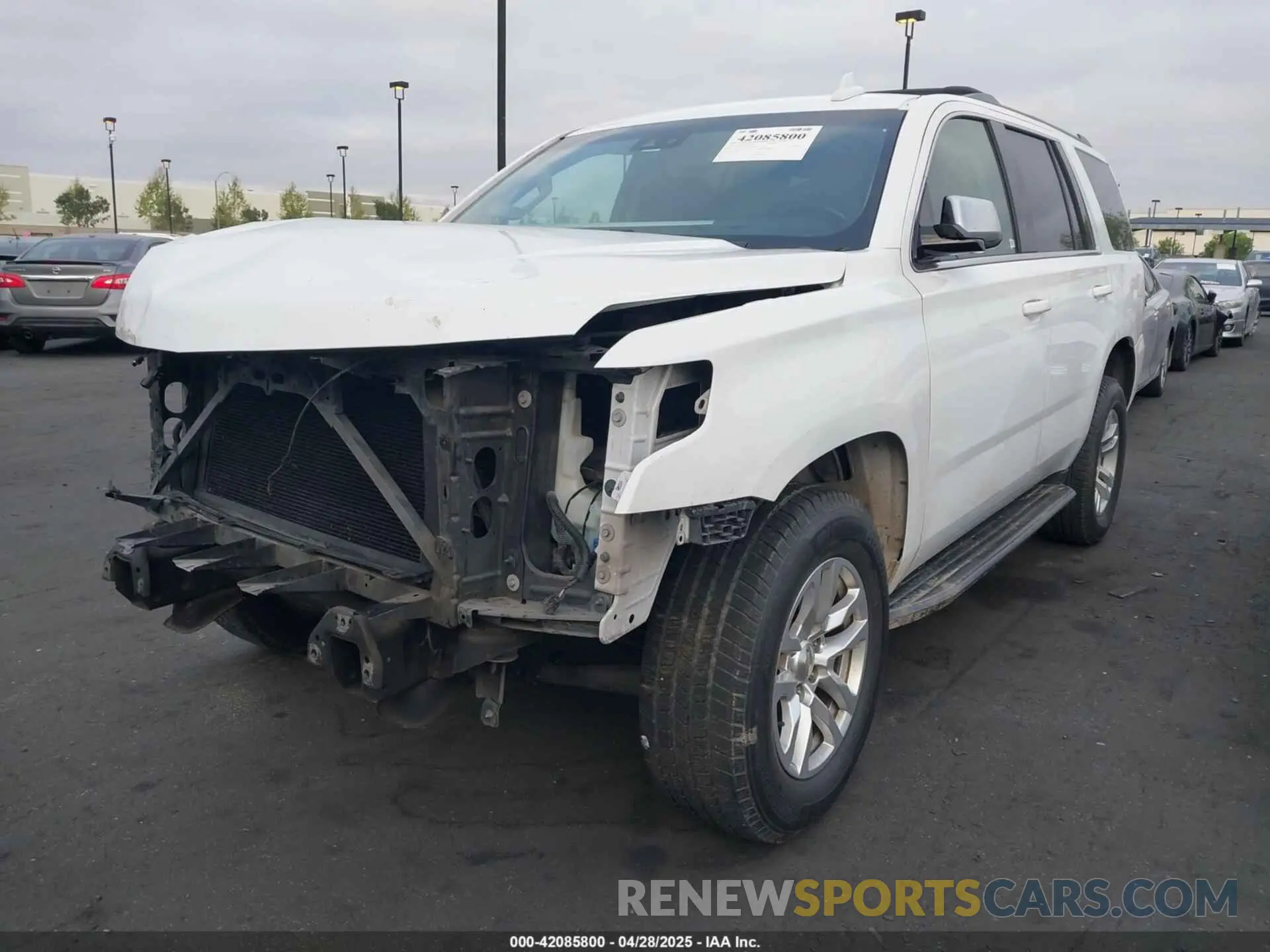 2 Photograph of a damaged car 1GNSKBKC5KR273544 CHEVROLET TAHOE 2019
