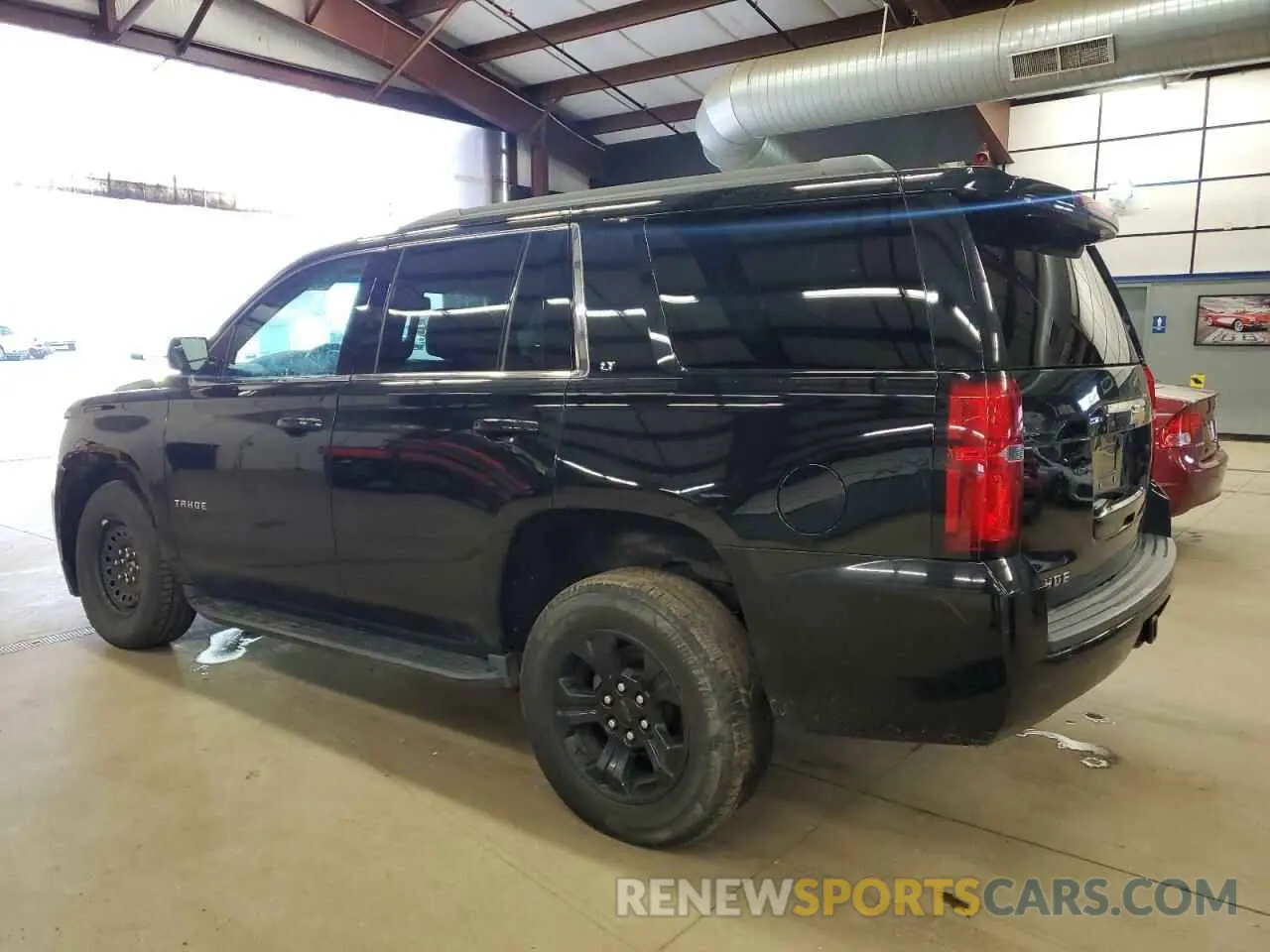 2 Photograph of a damaged car 1GNSKBKC6KR123068 CHEVROLET TAHOE 2019