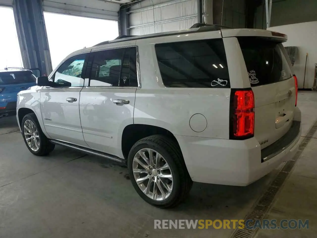 2 Photograph of a damaged car 1GNSKCKJXKR264407 CHEVROLET TAHOE 2019