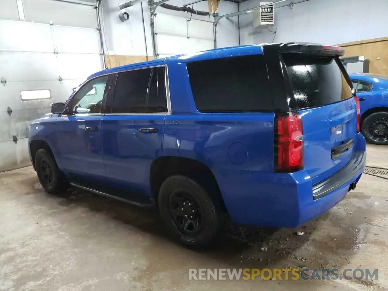 2 Photograph of a damaged car 1GNSKDEC7KR402729 CHEVROLET TAHOE 2019