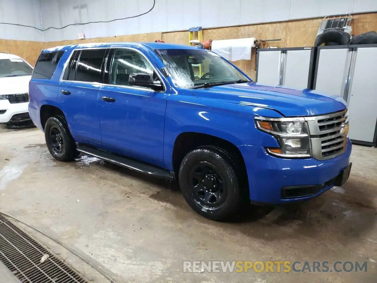 4 Photograph of a damaged car 1GNSKDEC7KR402729 CHEVROLET TAHOE 2019