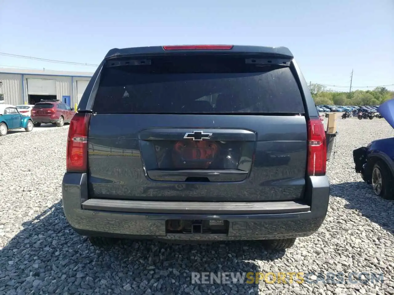 6 Photograph of a damaged car 1GNSKFKC7KR133437 CHEVROLET TAHOE 2019