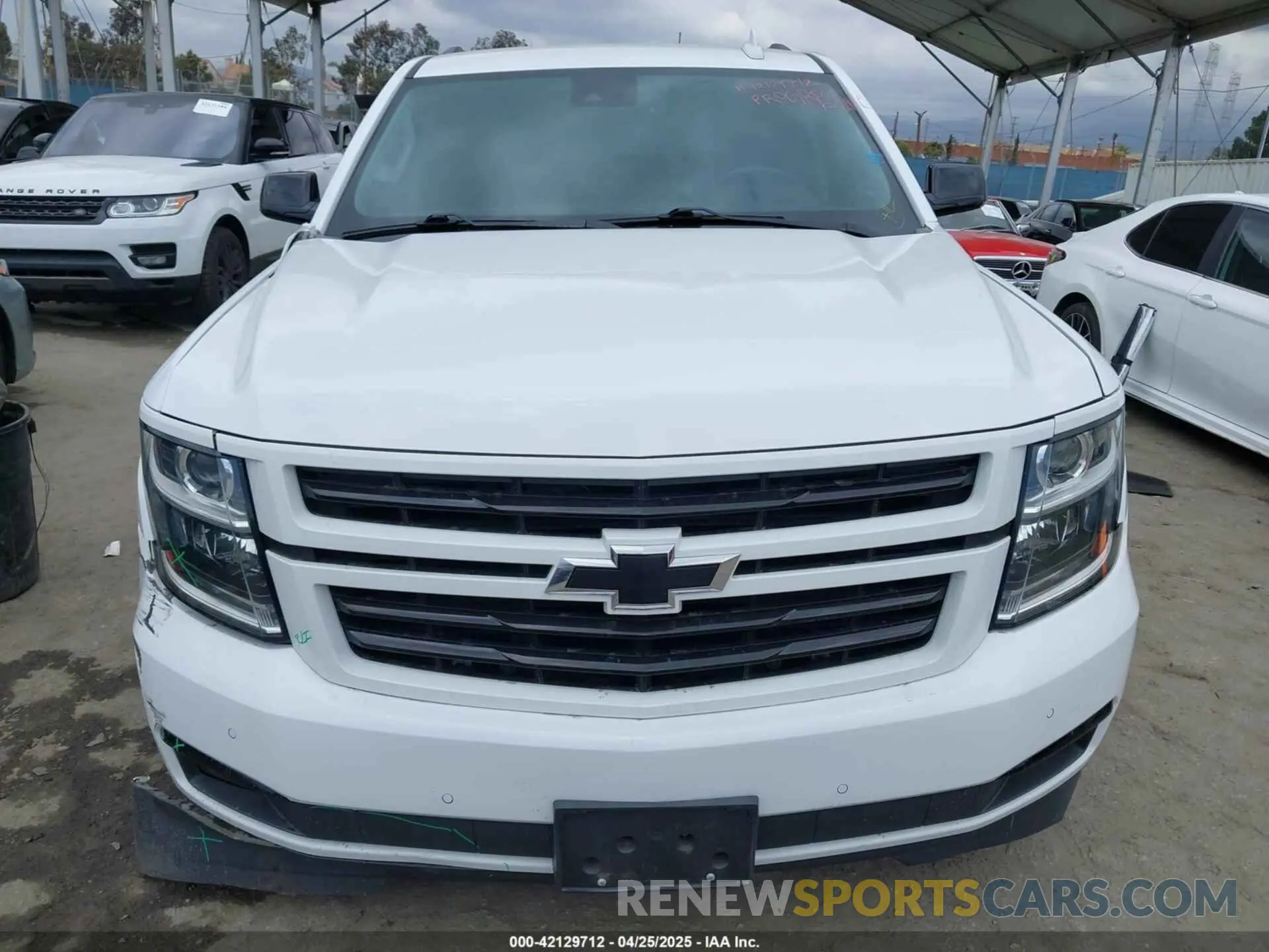 12 Photograph of a damaged car 1GNSCBKC0LR290170 CHEVROLET TAHOE 2020