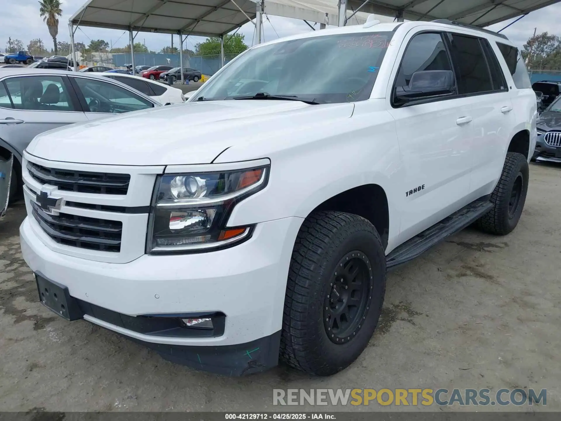 2 Photograph of a damaged car 1GNSCBKC0LR290170 CHEVROLET TAHOE 2020
