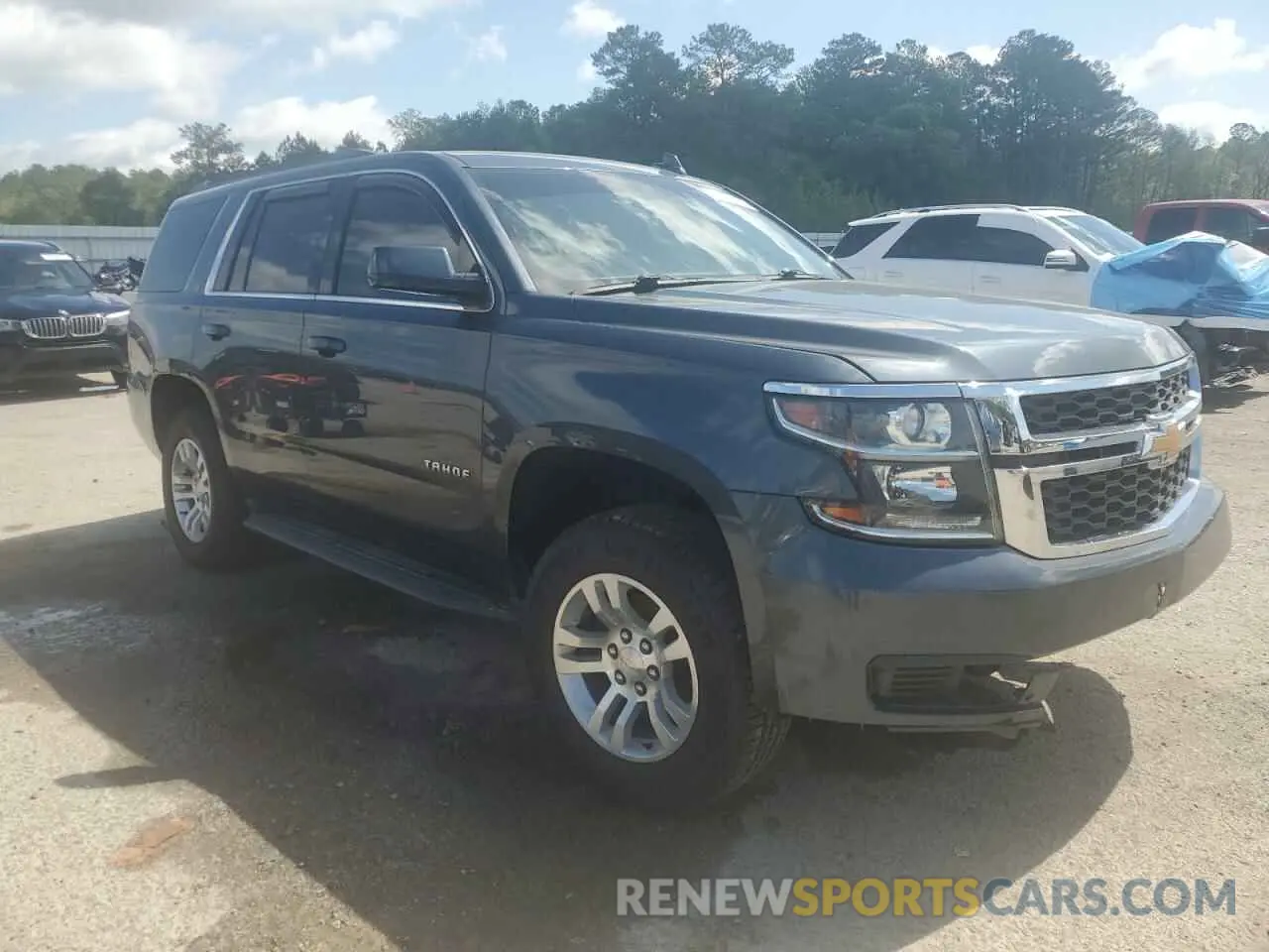 4 Photograph of a damaged car 1GNSCBKC3LR164904 CHEVROLET TAHOE 2020