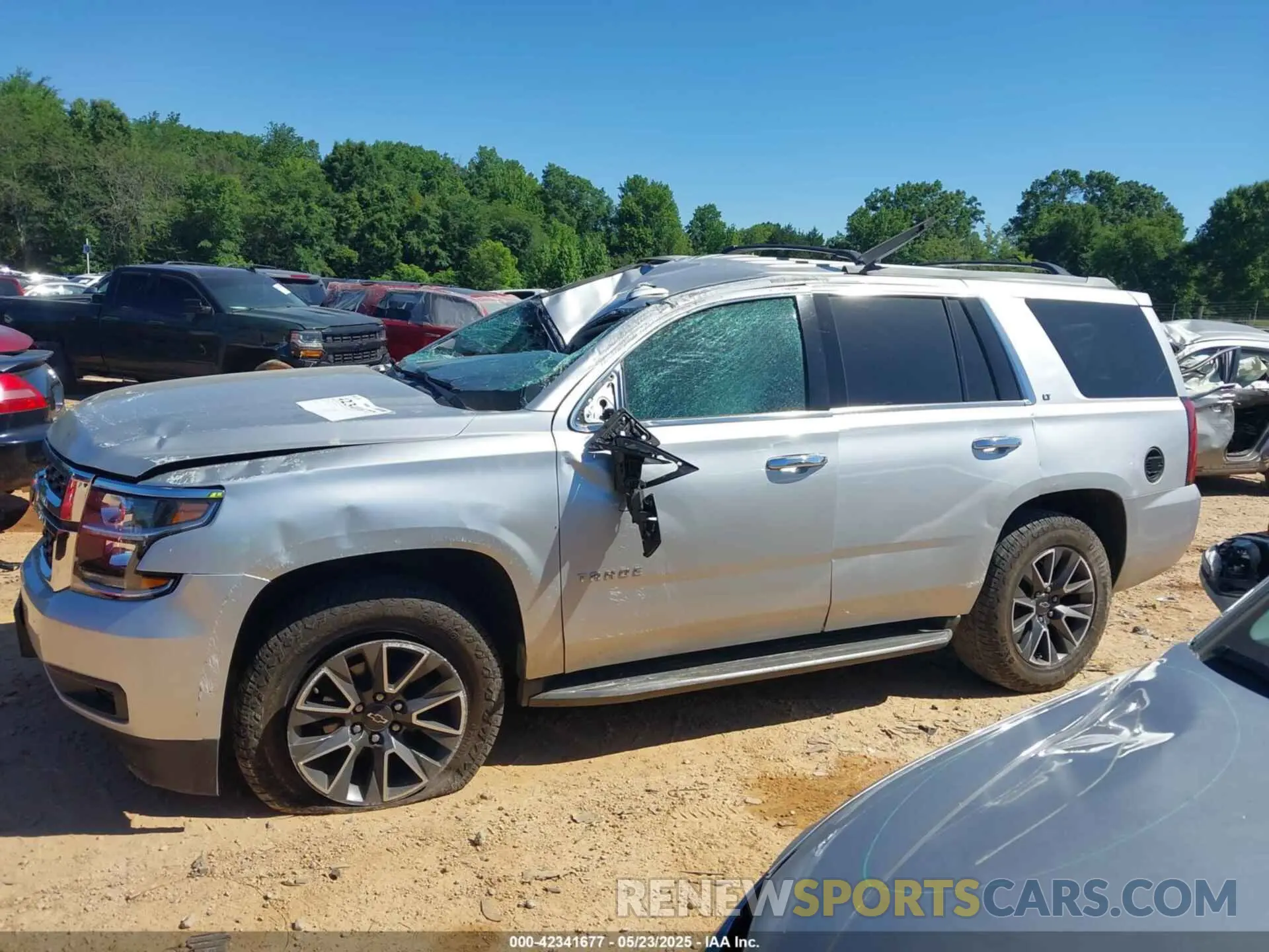 14 Photograph of a damaged car 1GNSKBKC5LR121085 CHEVROLET TAHOE 2020