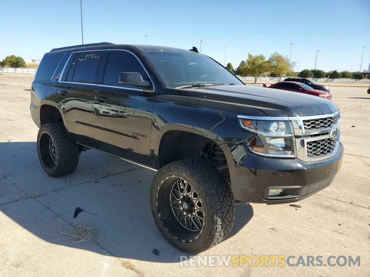 4 Photograph of a damaged car 1GNSKBKC8LR145977 CHEVROLET TAHOE 2020