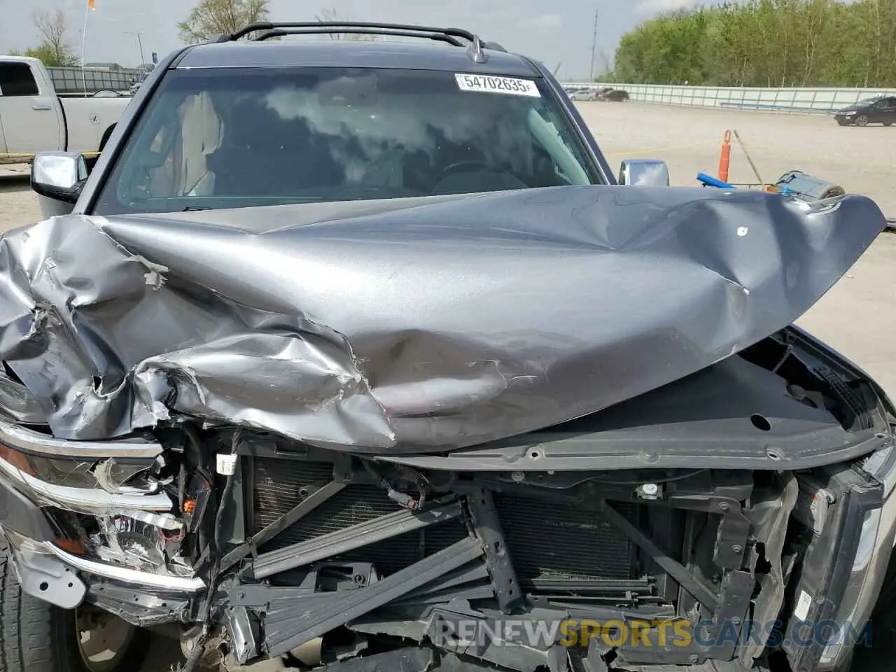 11 Photograph of a damaged car 1GNSKCKC7LR125399 CHEVROLET TAHOE 2020