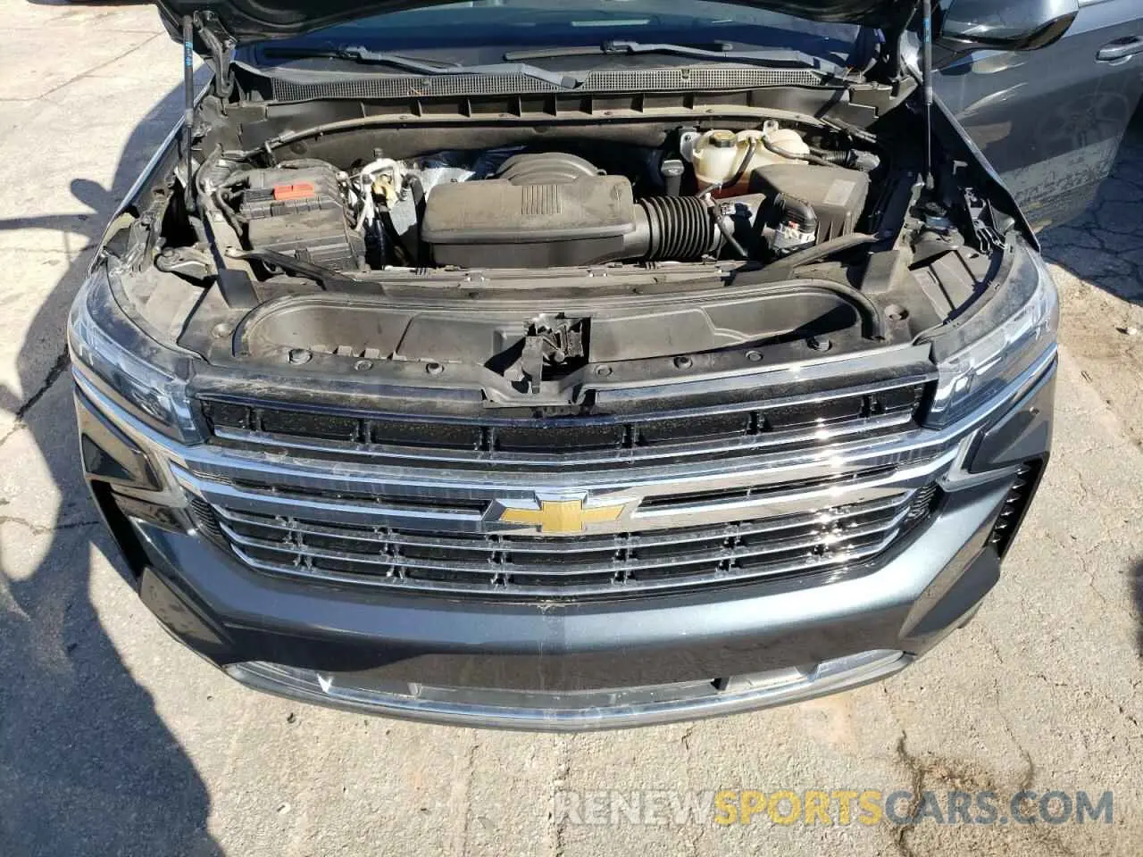 12 Photograph of a damaged car 1GNSCNKD0MR222527 CHEVROLET TAHOE 2021