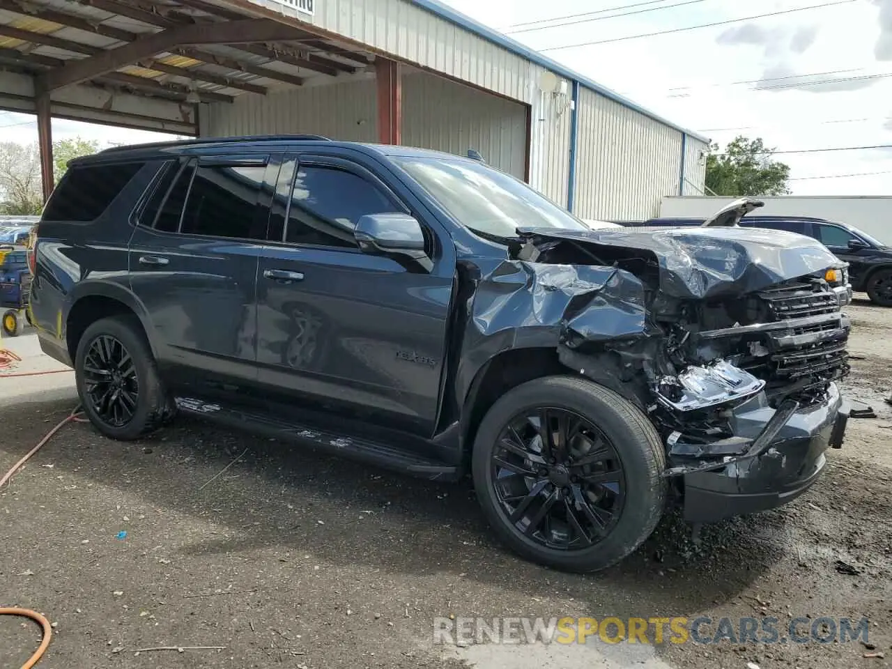 4 Photograph of a damaged car 1GNSCNKD5MR110516 CHEVROLET TAHOE 2021
