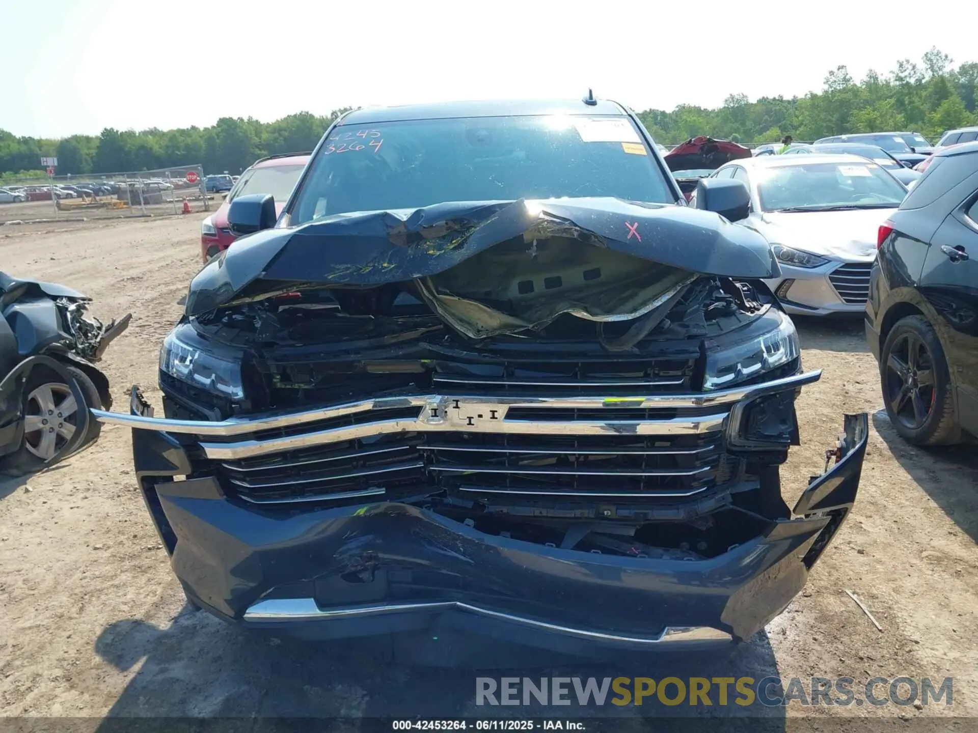 12 Photograph of a damaged car 1GNSKNKD8MR102008 CHEVROLET TAHOE 2021