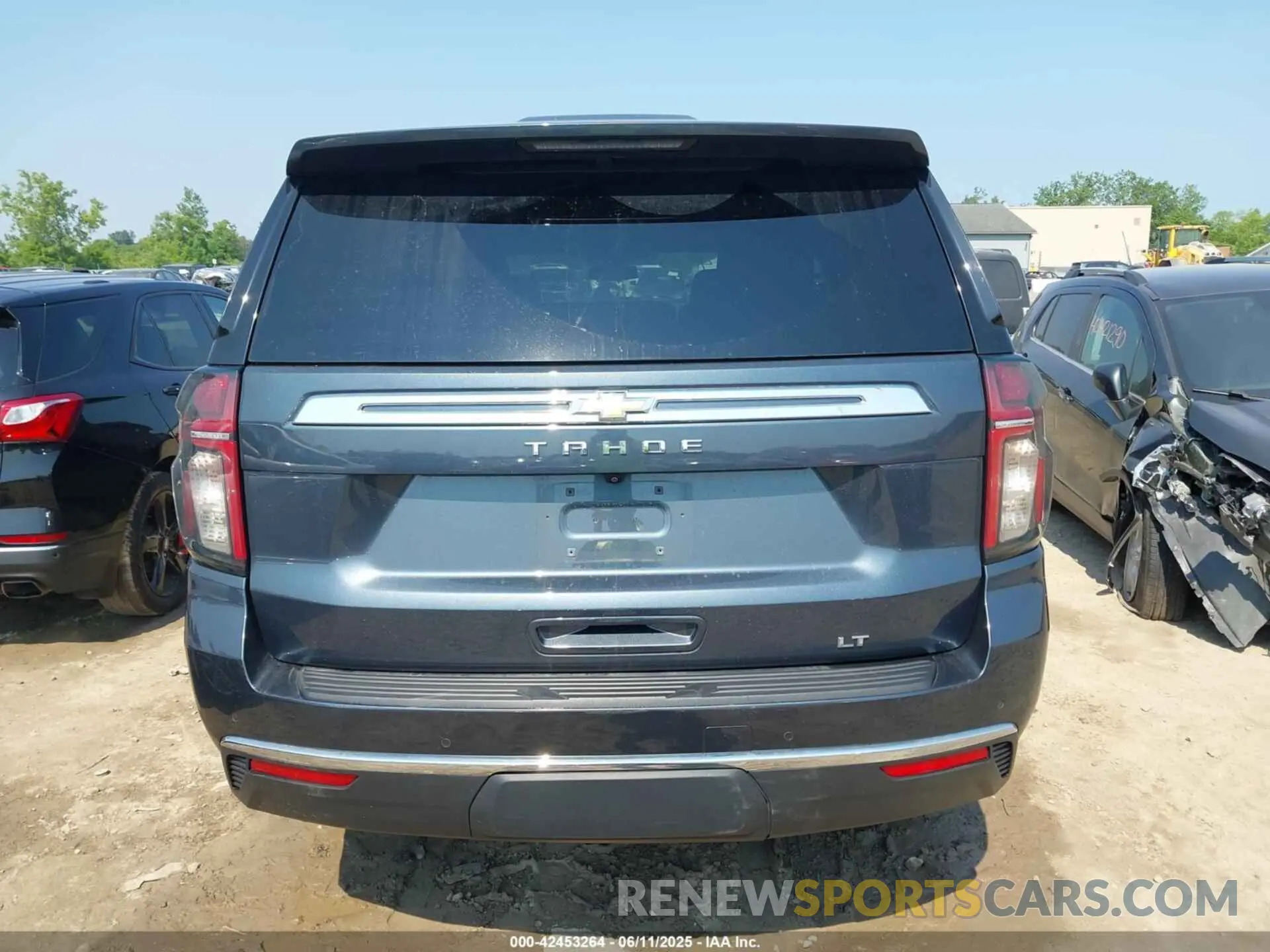 16 Photograph of a damaged car 1GNSKNKD8MR102008 CHEVROLET TAHOE 2021