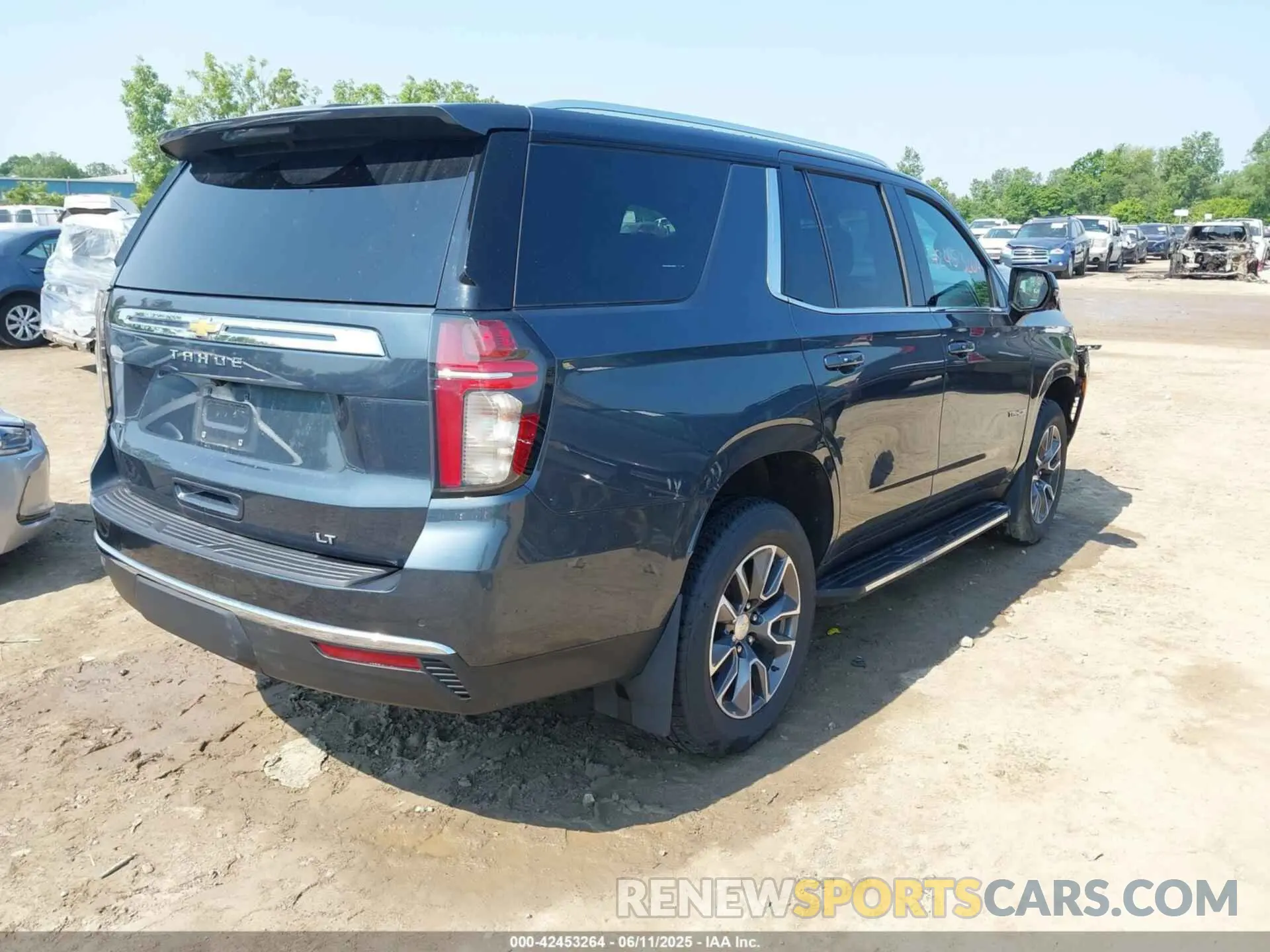 4 Photograph of a damaged car 1GNSKNKD8MR102008 CHEVROLET TAHOE 2021