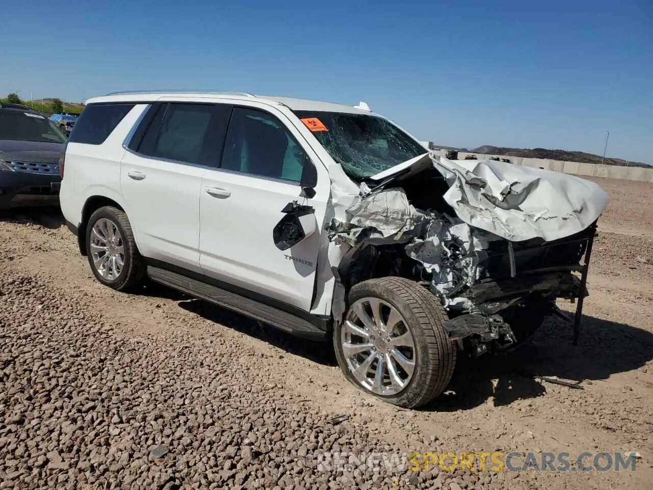 4 Photograph of a damaged car 1GNSKNKD8MR231429 CHEVROLET TAHOE 2021