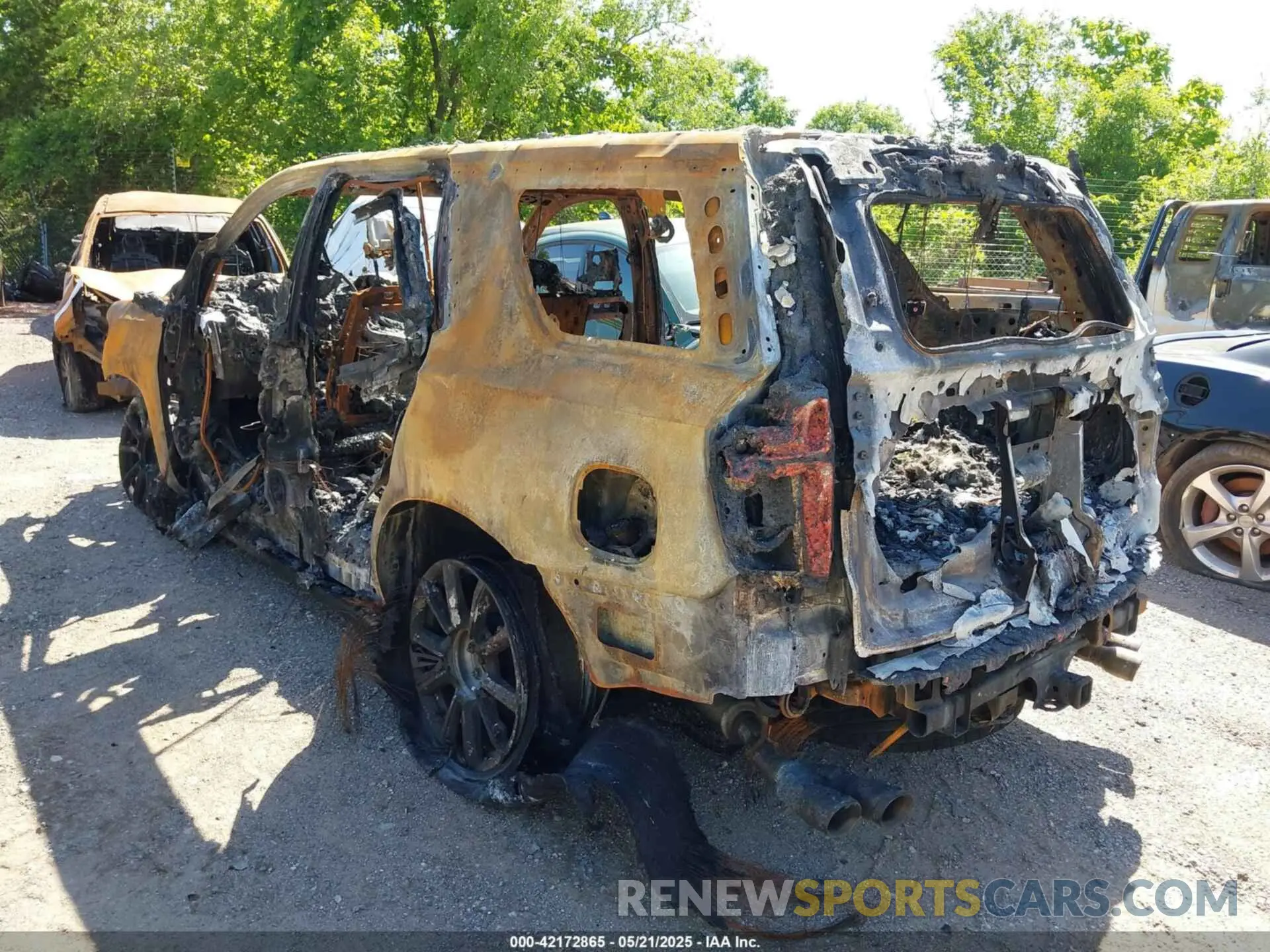 3 Photograph of a damaged car 1GNSKTKL3MR428889 CHEVROLET TAHOE 2021