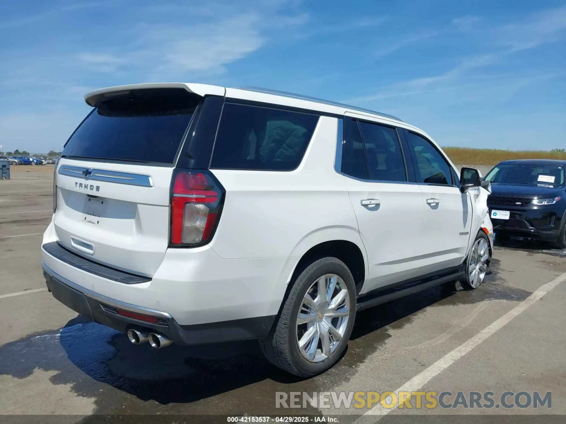4 Photograph of a damaged car 1GNSKTKL5MR125676 CHEVROLET TAHOE 2021