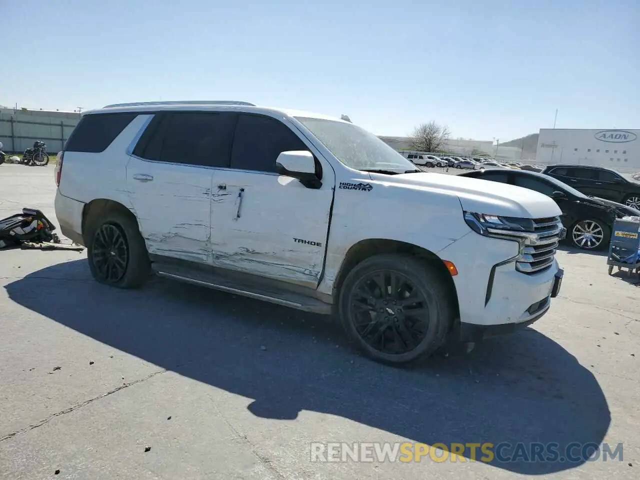 4 Photograph of a damaged car 1GNSKTKLXMR166711 CHEVROLET TAHOE 2021