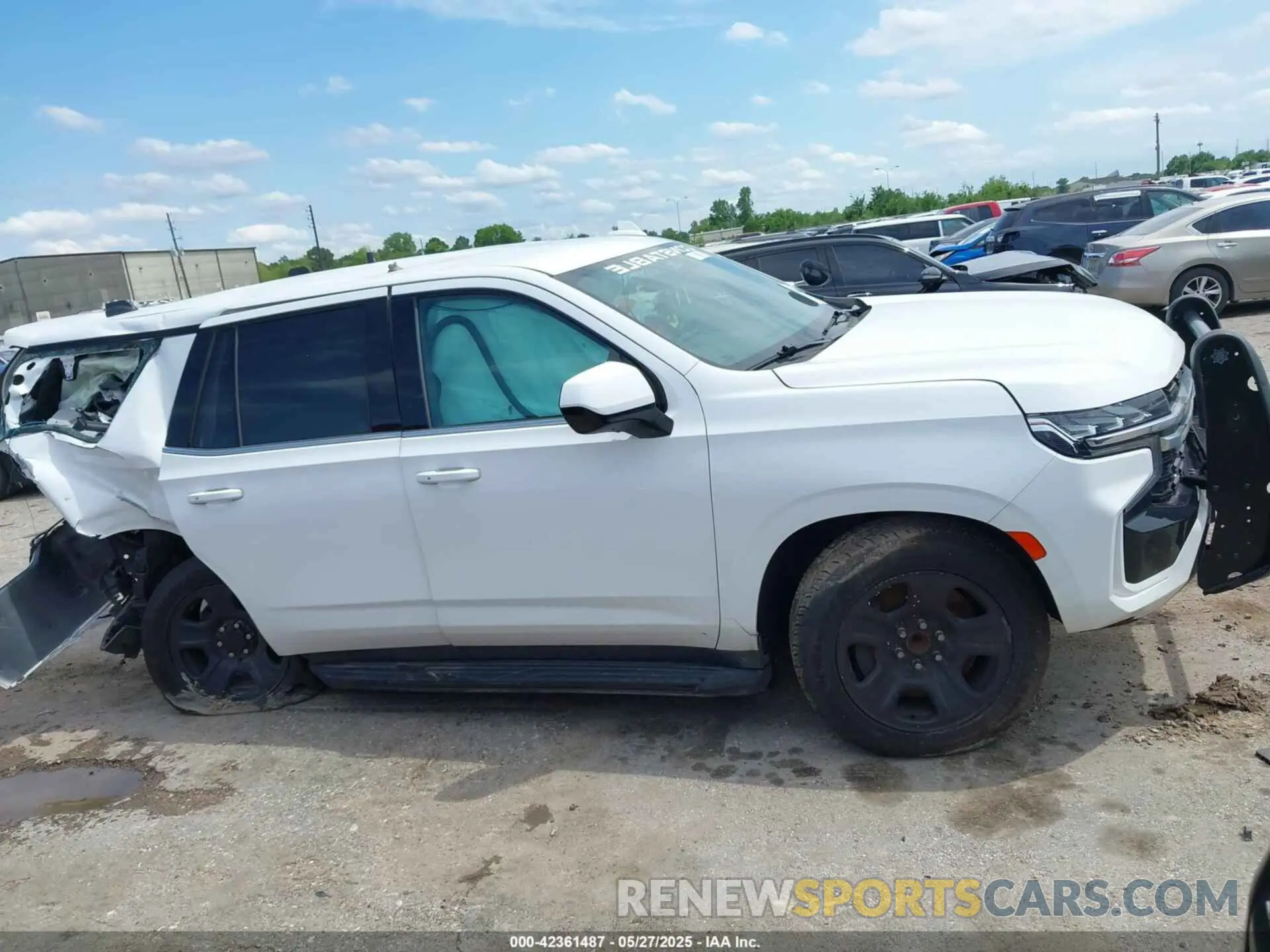 12 Photograph of a damaged car 1GNSCLED3NR129342 CHEVROLET TAHOE 2022