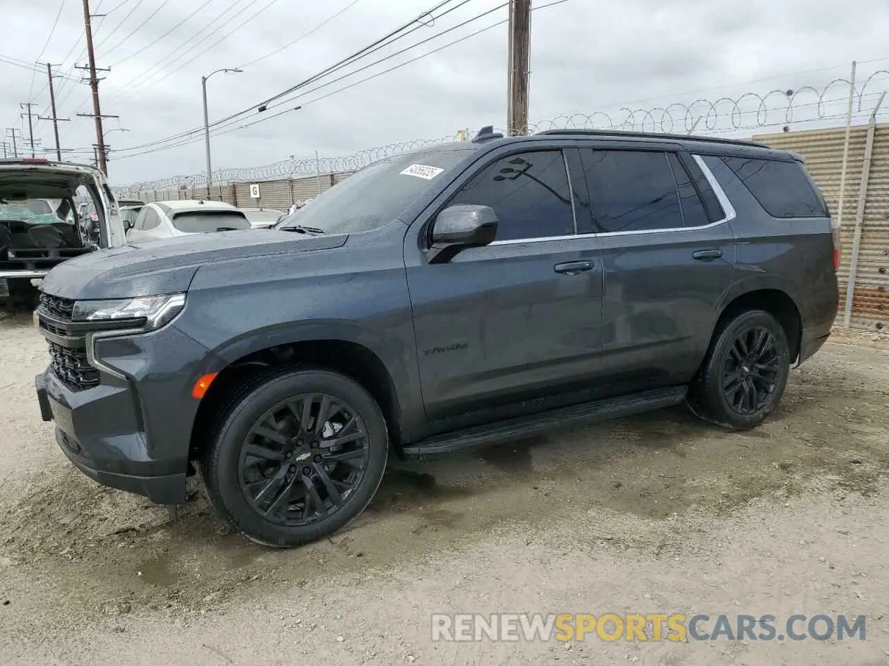 1 Photograph of a damaged car 1GNSCMKDXNR182095 CHEVROLET TAHOE 2022