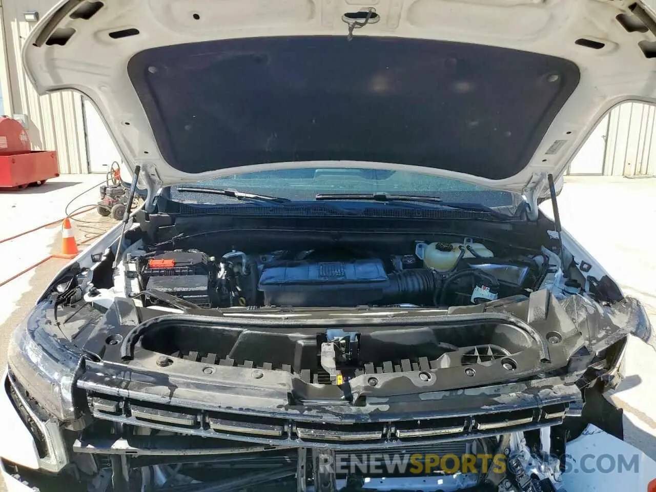12 Photograph of a damaged car 1GNSCRKD1NR337890 CHEVROLET TAHOE 2022