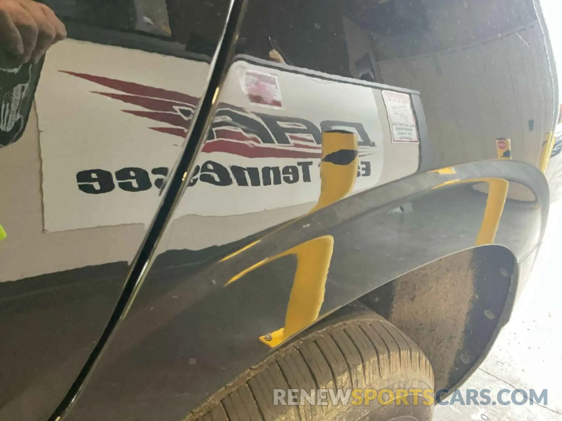 3 Photograph of a damaged car 1GNSKMKD7NR129745 CHEVROLET TAHOE 2022