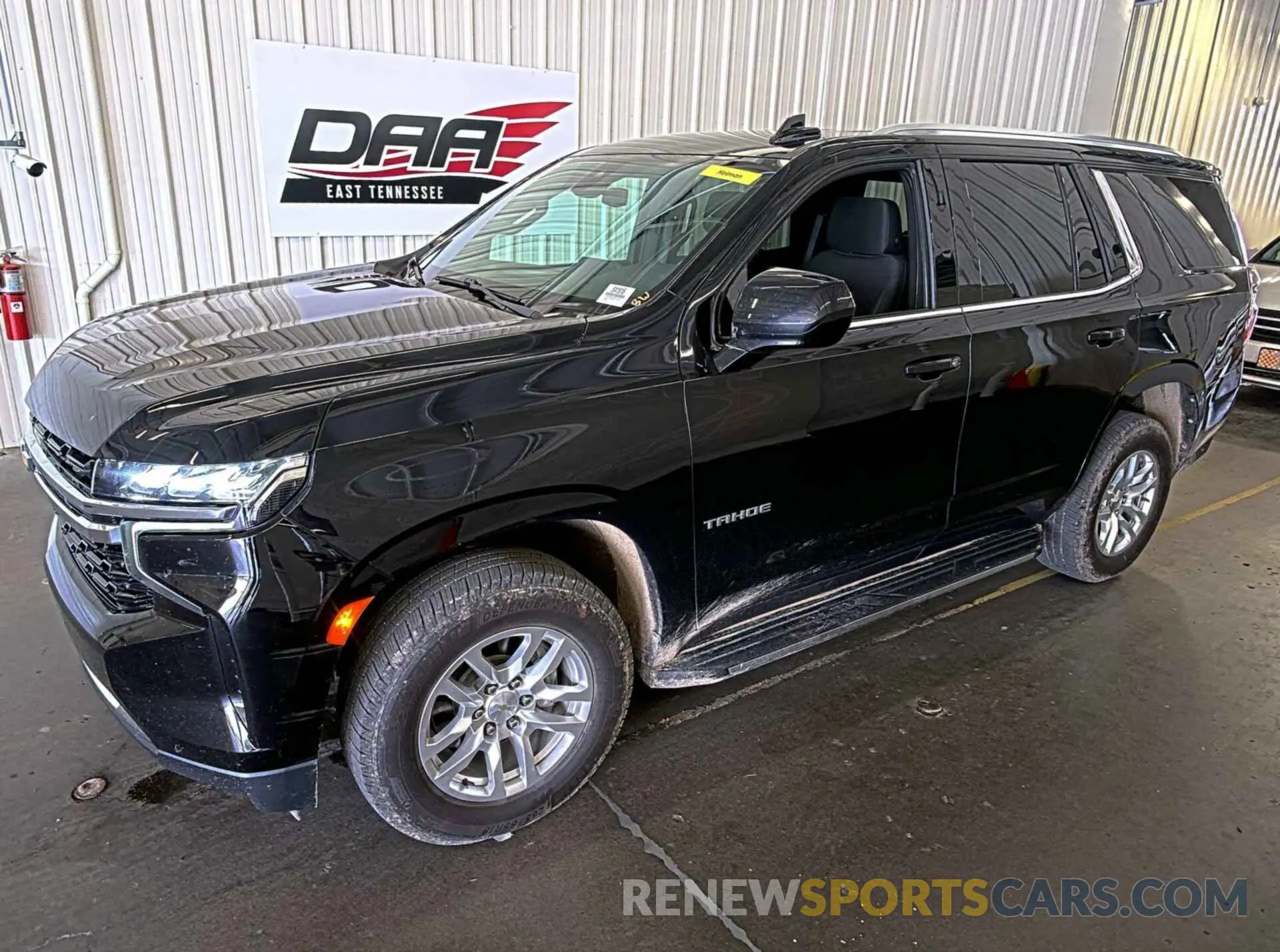 31 Photograph of a damaged car 1GNSKMKD7NR129745 CHEVROLET TAHOE 2022