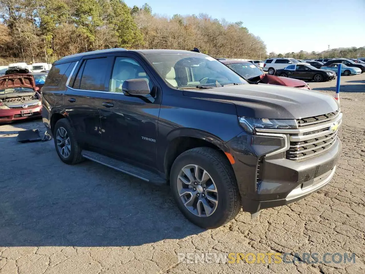 4 Photograph of a damaged car 1GNSKNKD2NR309561 CHEVROLET TAHOE 2022