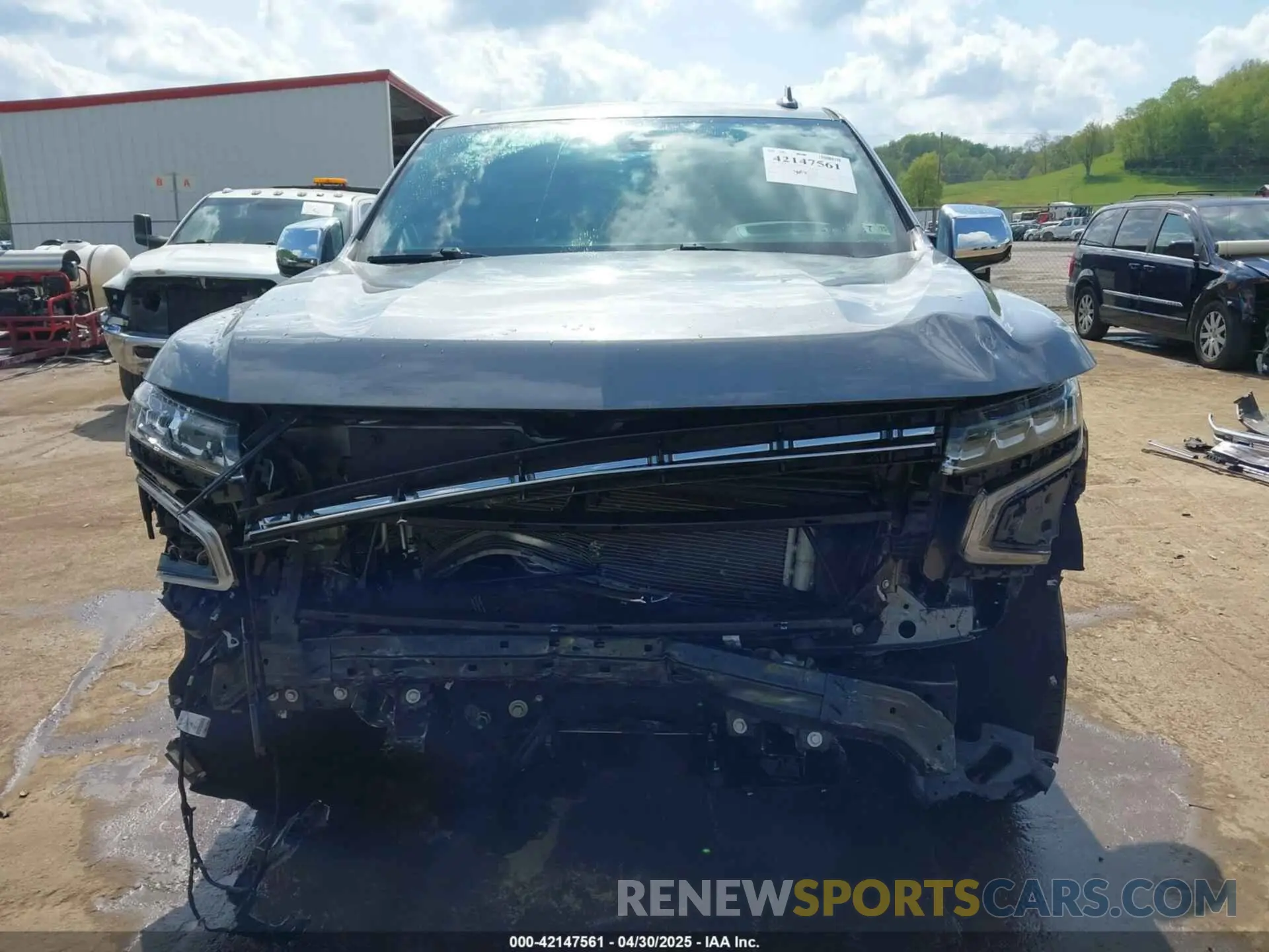 12 Photograph of a damaged car 1GNSKSKD3NR313343 CHEVROLET TAHOE 2022