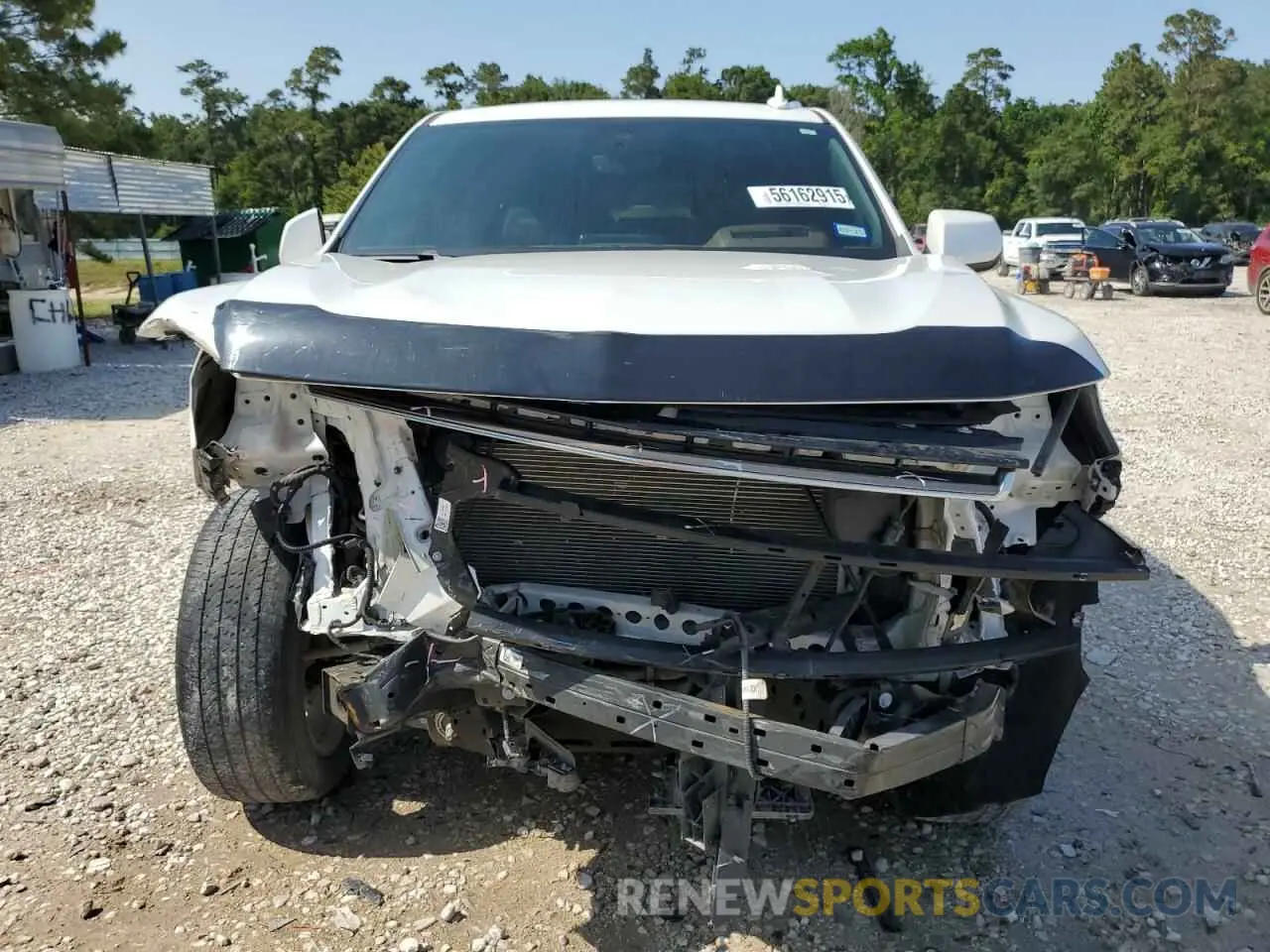 5 Photograph of a damaged car 1GNSKTKL5NR186348 CHEVROLET TAHOE 2022