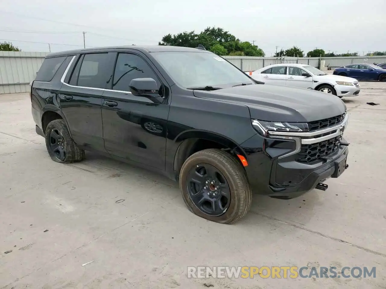 4 Photograph of a damaged car 1GNSCLED7PR428027 CHEVROLET TAHOE 2023