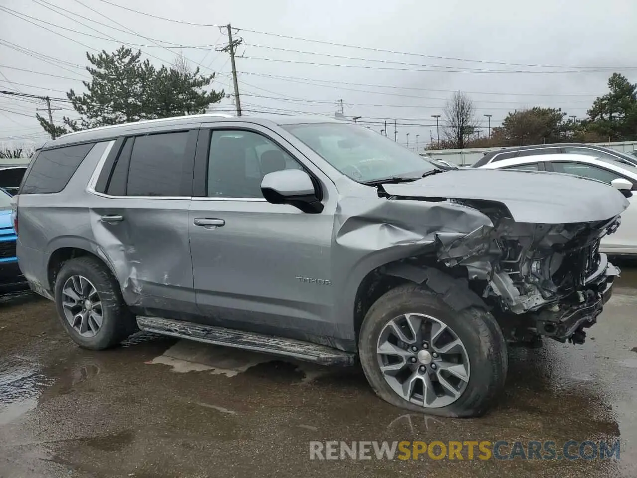 4 Photograph of a damaged car 1GNSKMKD5PR474422 CHEVROLET TAHOE 2023
