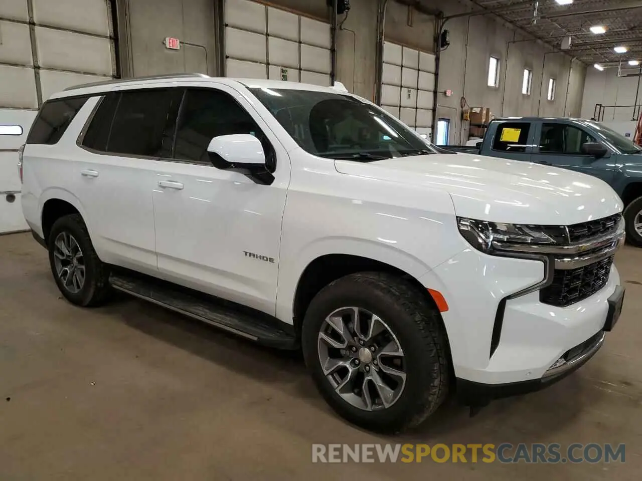 4 Photograph of a damaged car 1GNSKMKD6PR488331 CHEVROLET TAHOE 2023