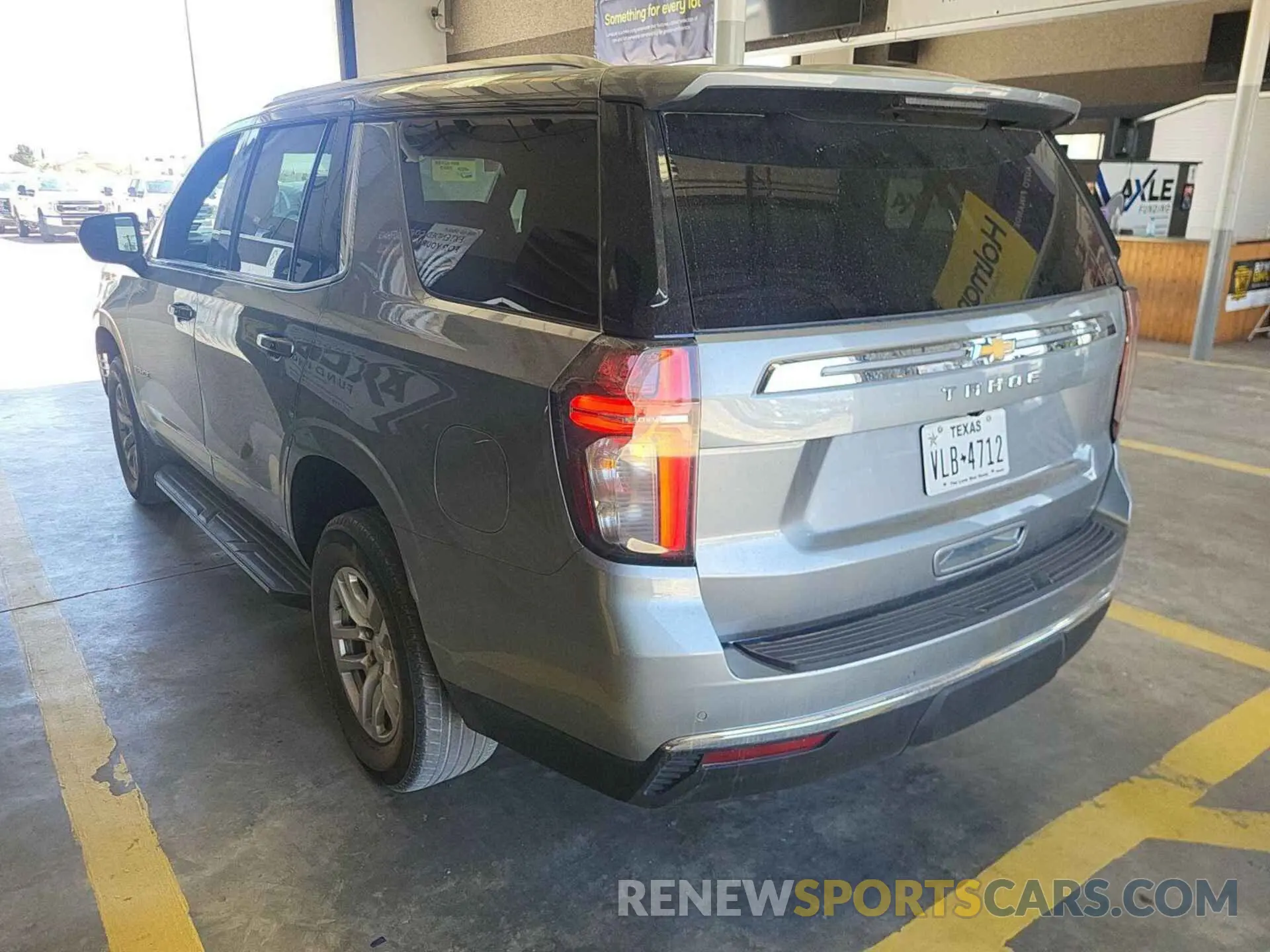 4 Photograph of a damaged car 1GNSKMKD9PR200138 CHEVROLET TAHOE 2023