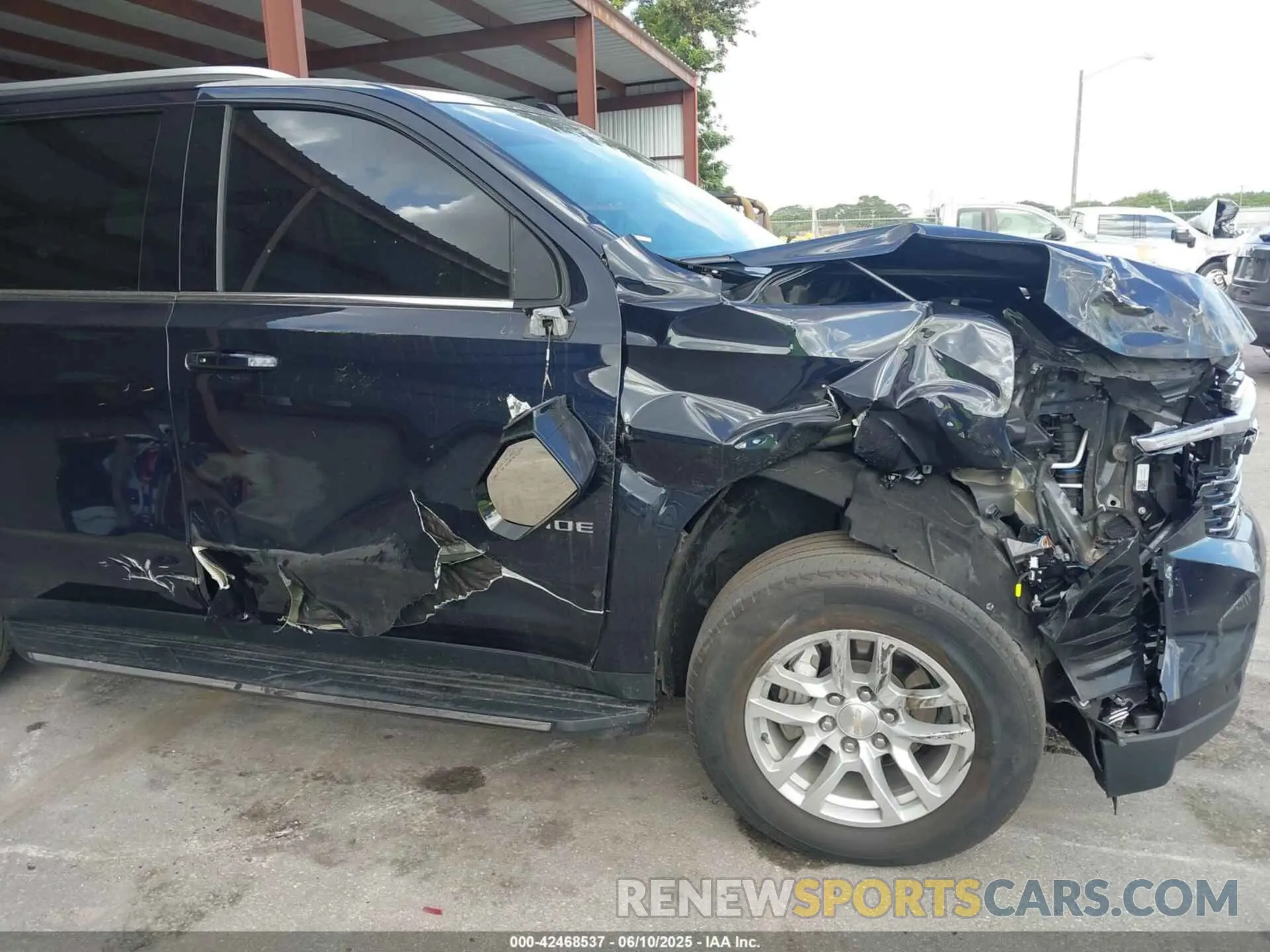 18 Photograph of a damaged car 1GNSKNKD6PR198449 CHEVROLET TAHOE 2023