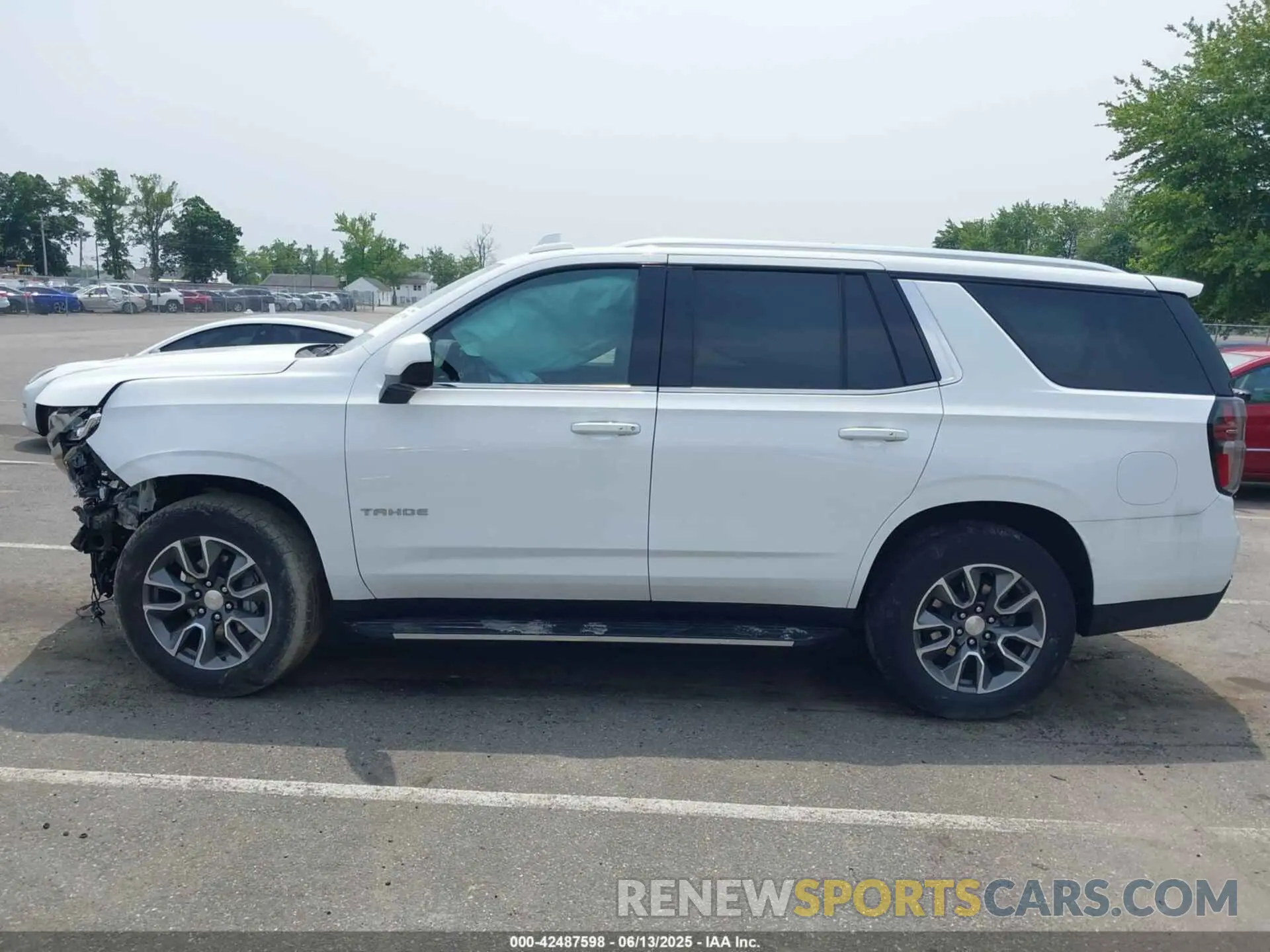 13 Photograph of a damaged car 1GNSKNKD7PR119905 CHEVROLET TAHOE 2023