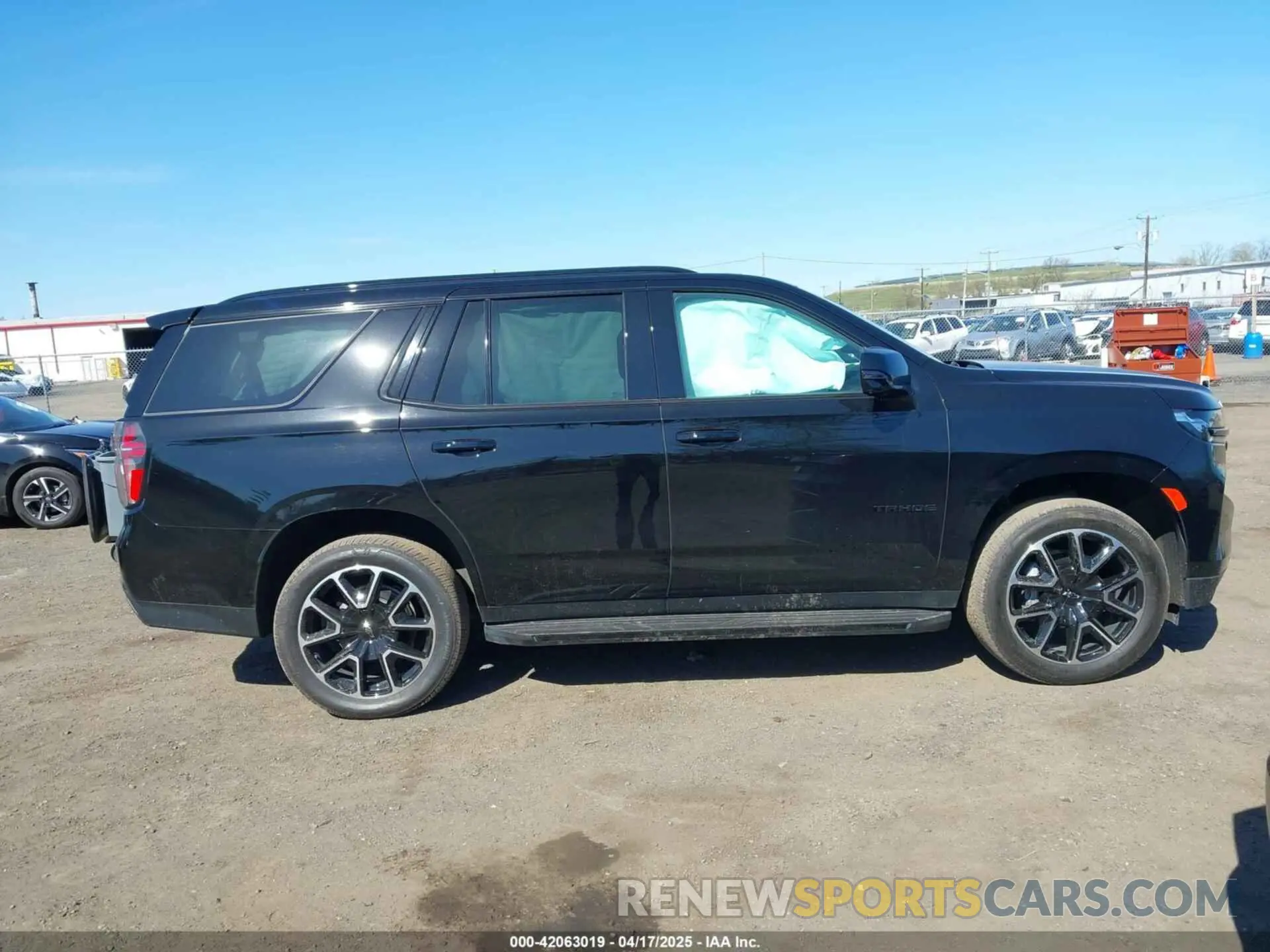 13 Photograph of a damaged car 1GNSKRKD4PR327926 CHEVROLET TAHOE 2023