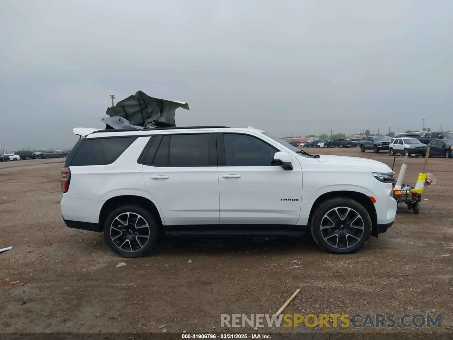 13 Photograph of a damaged car 1GNSKRKD4PR427153 CHEVROLET TAHOE 2023