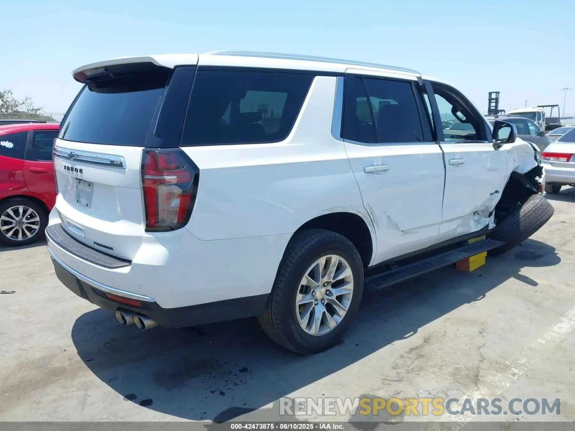 4 Photograph of a damaged car 1GNSKSKD0PR262516 CHEVROLET TAHOE 2023