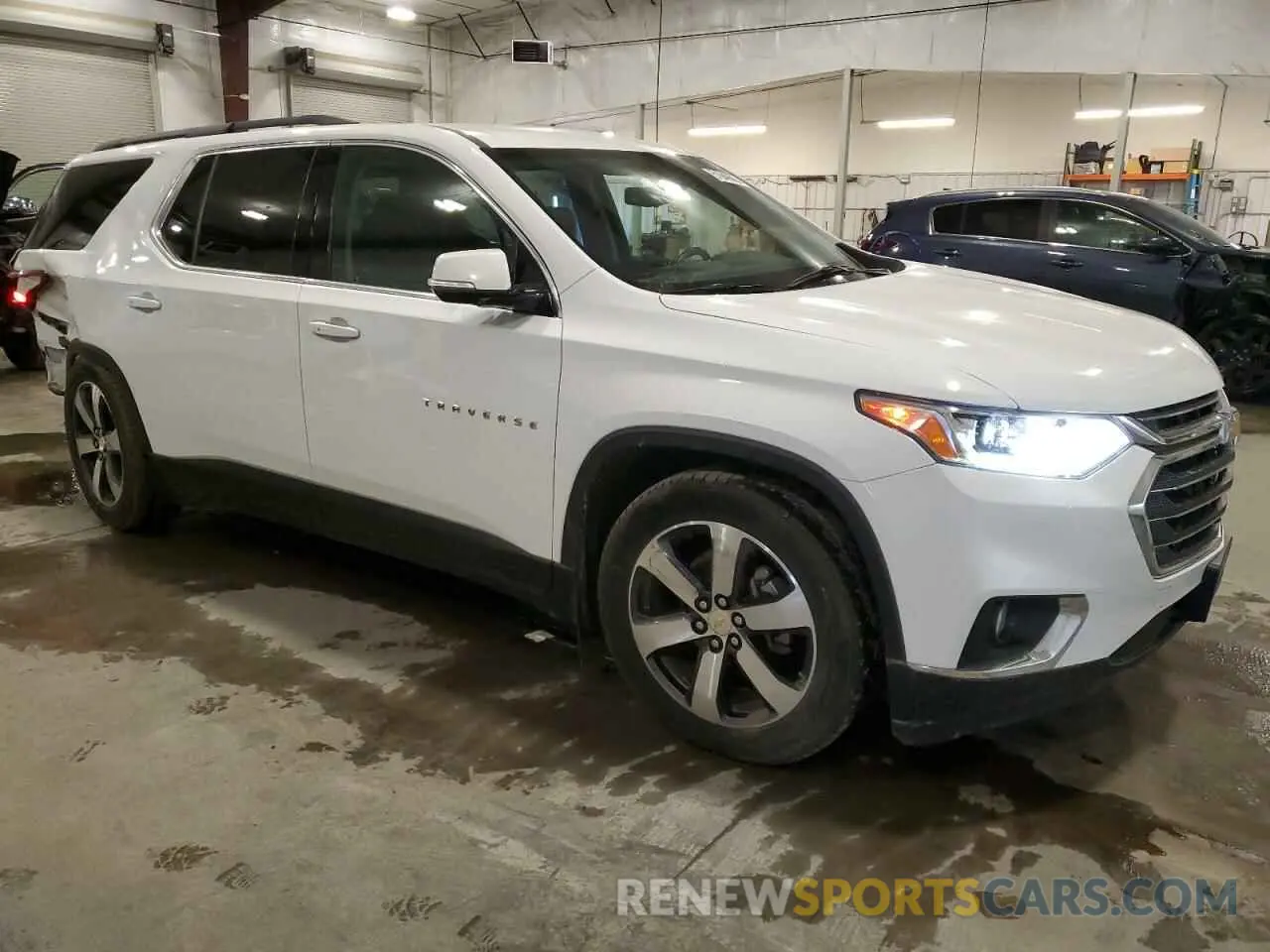 4 Photograph of a damaged car 1GNEVHKW5KJ205714 CHEVROLET TRAVERSE 2019